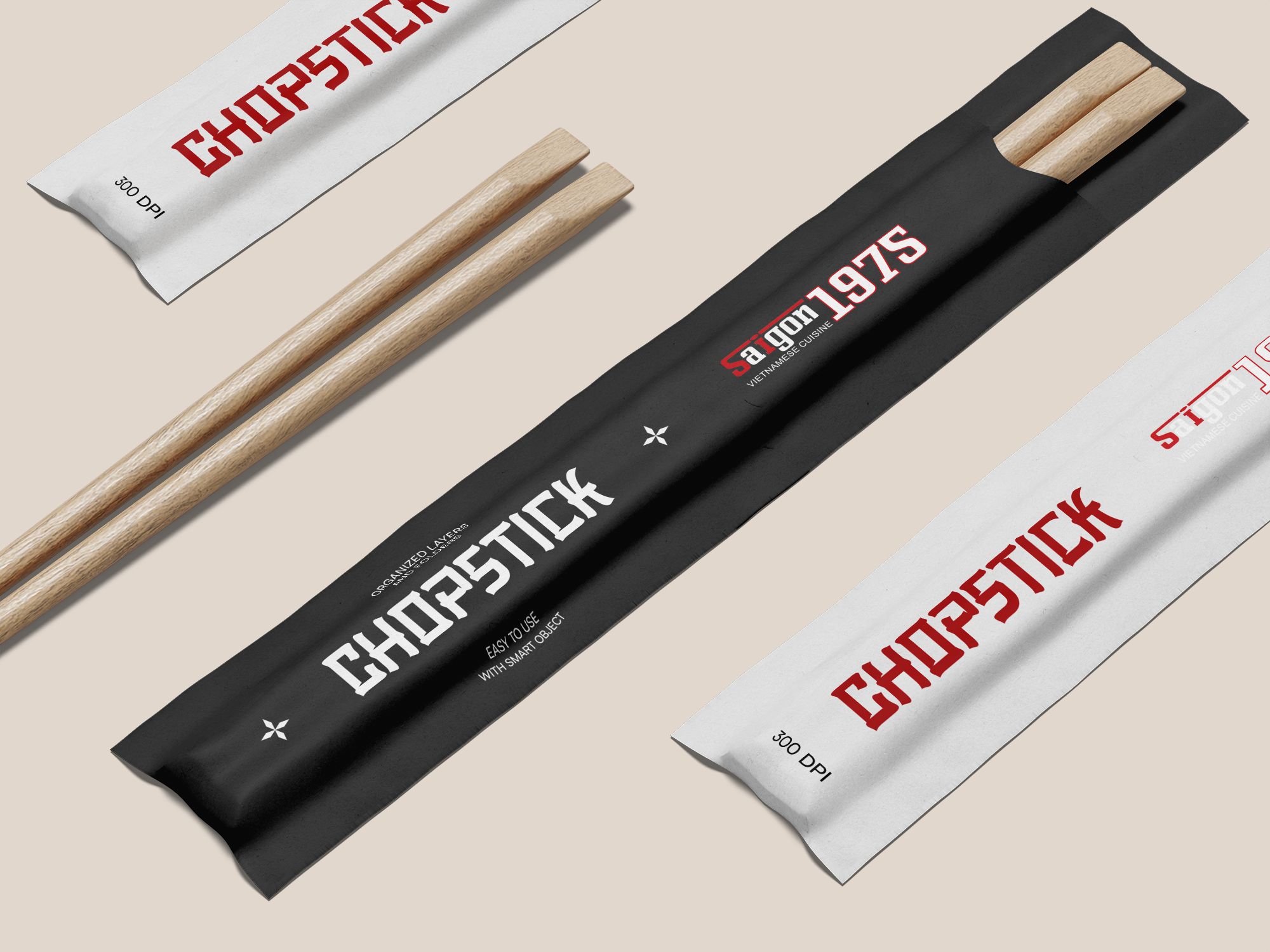 Two pairs of wooden chopsticks and two paper sleeves for chopsticks, one black and one white, with red and white text, on a plain background.
