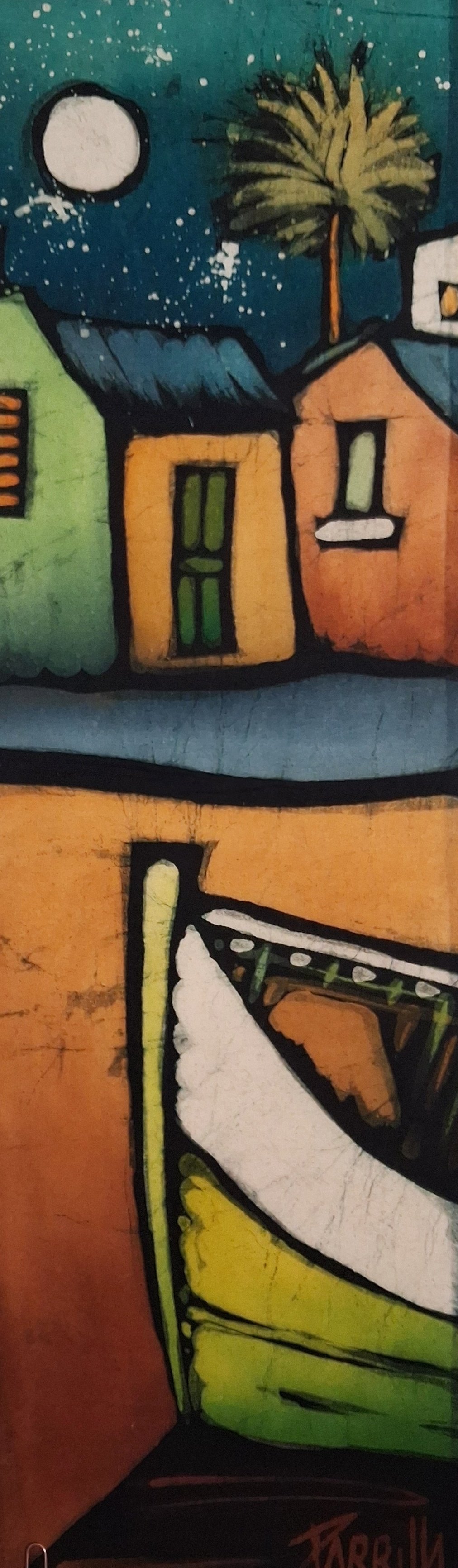 Colorful mural depicting houses with a night sky, full moon, a palm tree, and an armchair with a cushion.