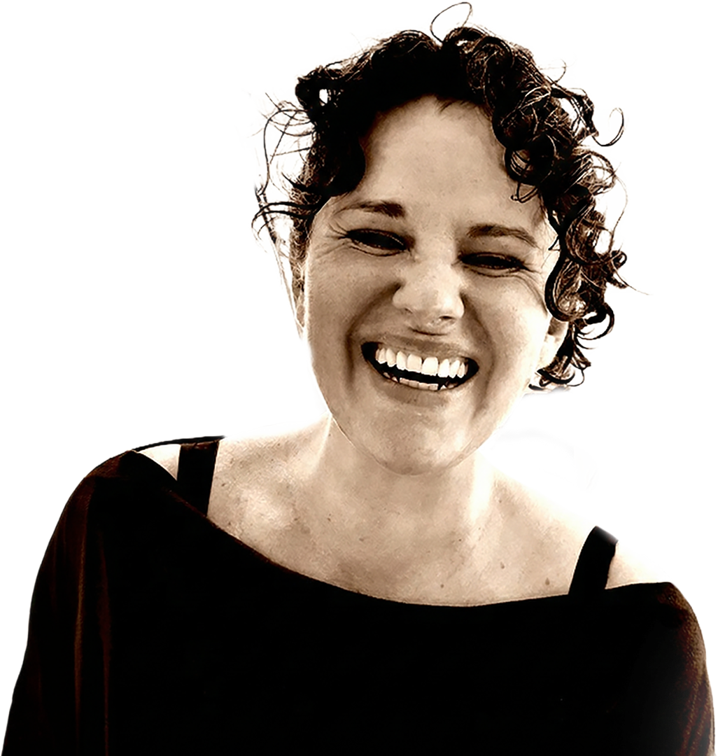 Homepage: A portrait photograph of Leoni Selby, founder of The Messy Art of Humaning, an expert in strategy, design, and operations offering coaching for multipassionate professionals.