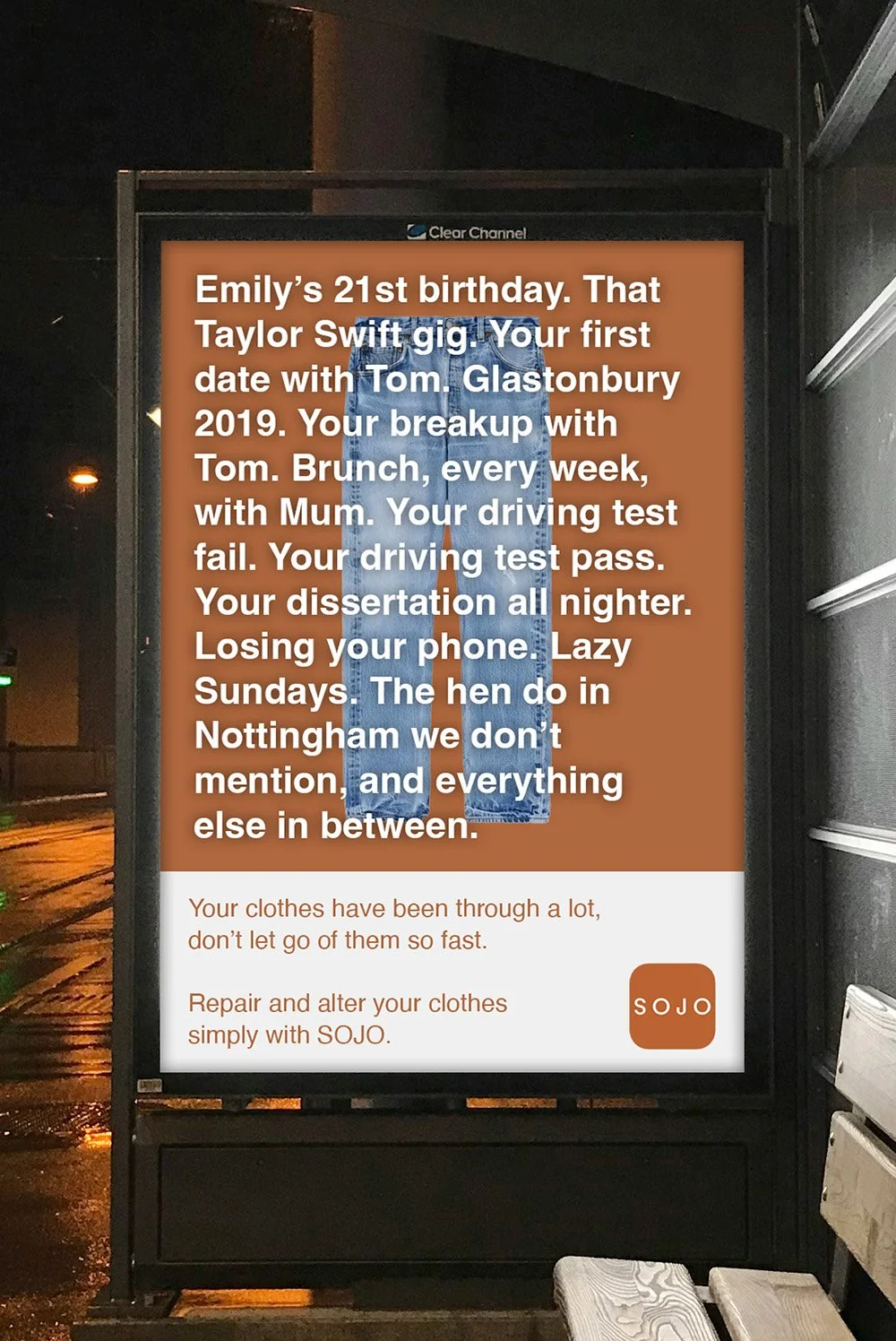 Nighttime advertisement on a bus stop for SOJO, describing personal memories of someone named Emily's 21st birthday, relationships, and personal milestones, with a focus on clothes repair and alteration services.