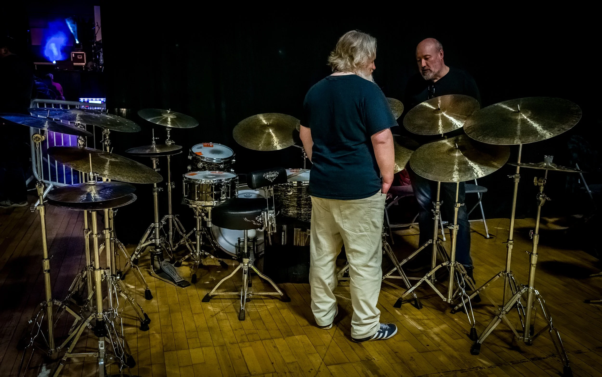 Mattie Foulds showing off MF Cymbals to Fraser Murray 