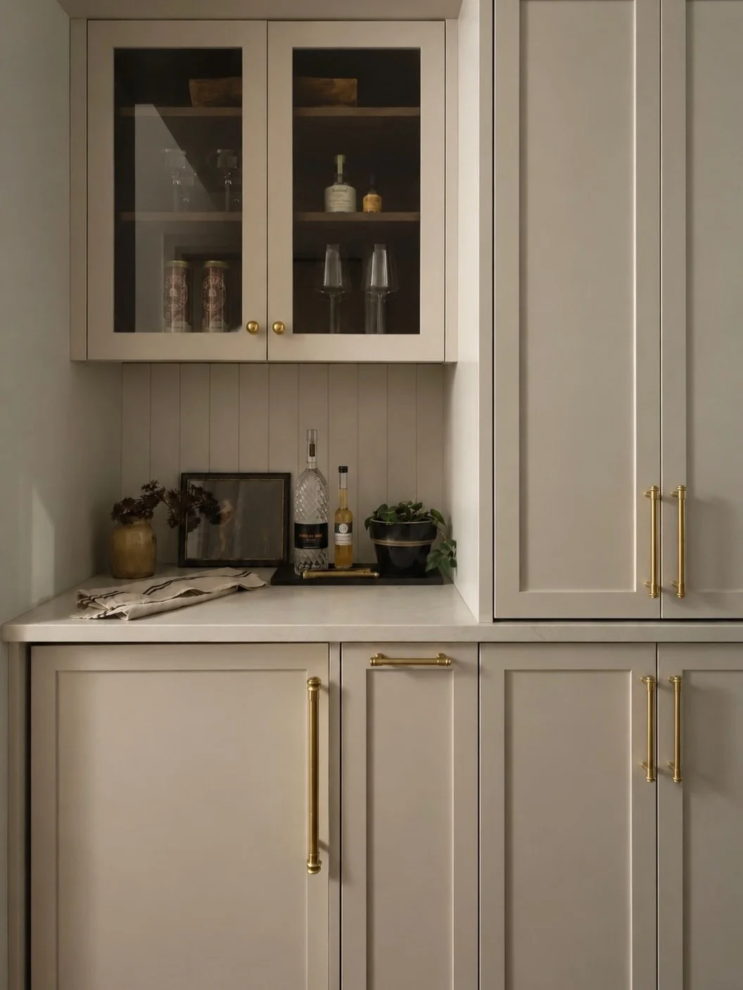 144 Park: this used to be a hall closet

Every condo has one. That awkward little closet off the kitchen nobody quite knows what to do with. We turned it into a moment - custom millwork, bar fridge, open shelving for glassware. 

Then we went one fur