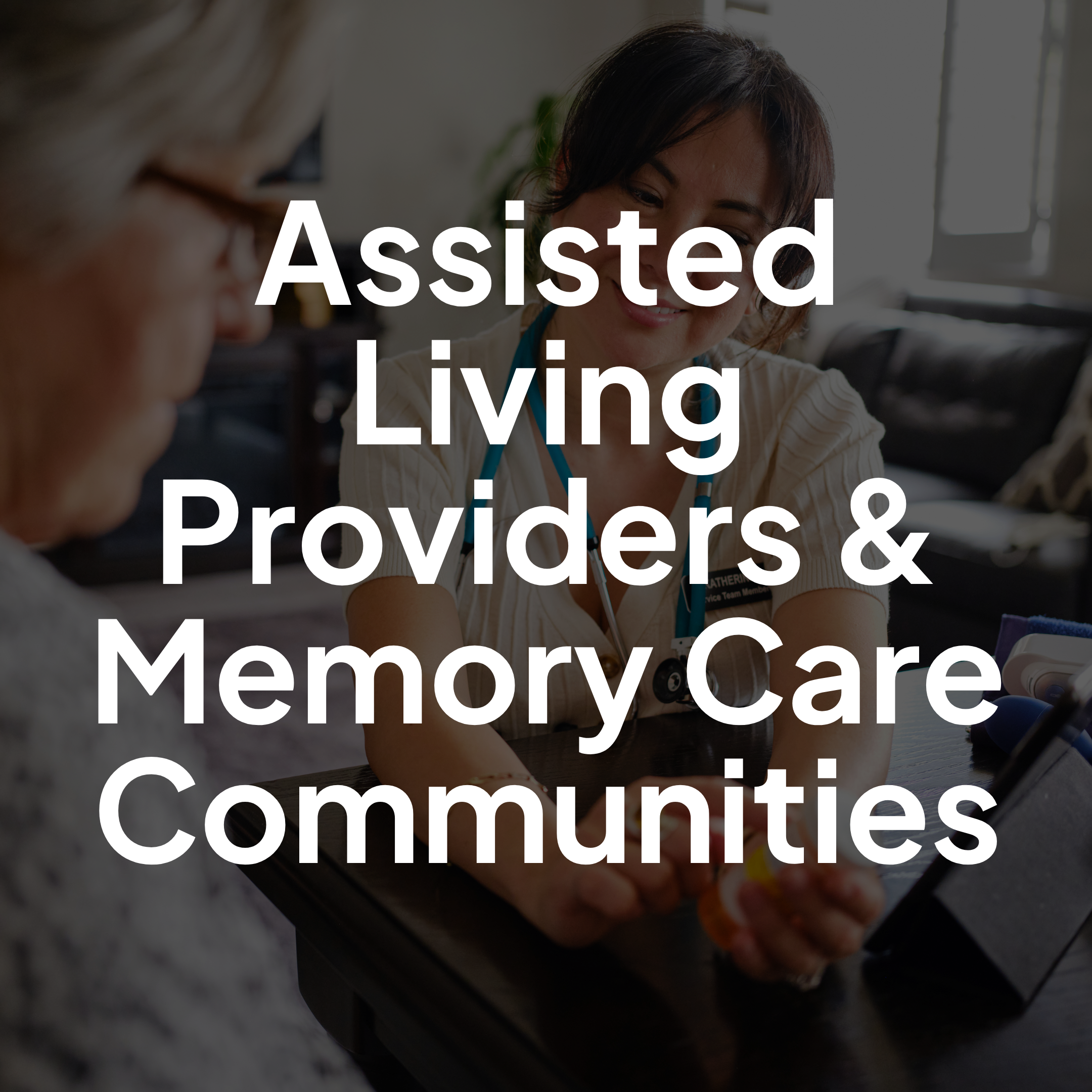 Assisted living and memory care staff engaging with residents in a supportive care community setting.