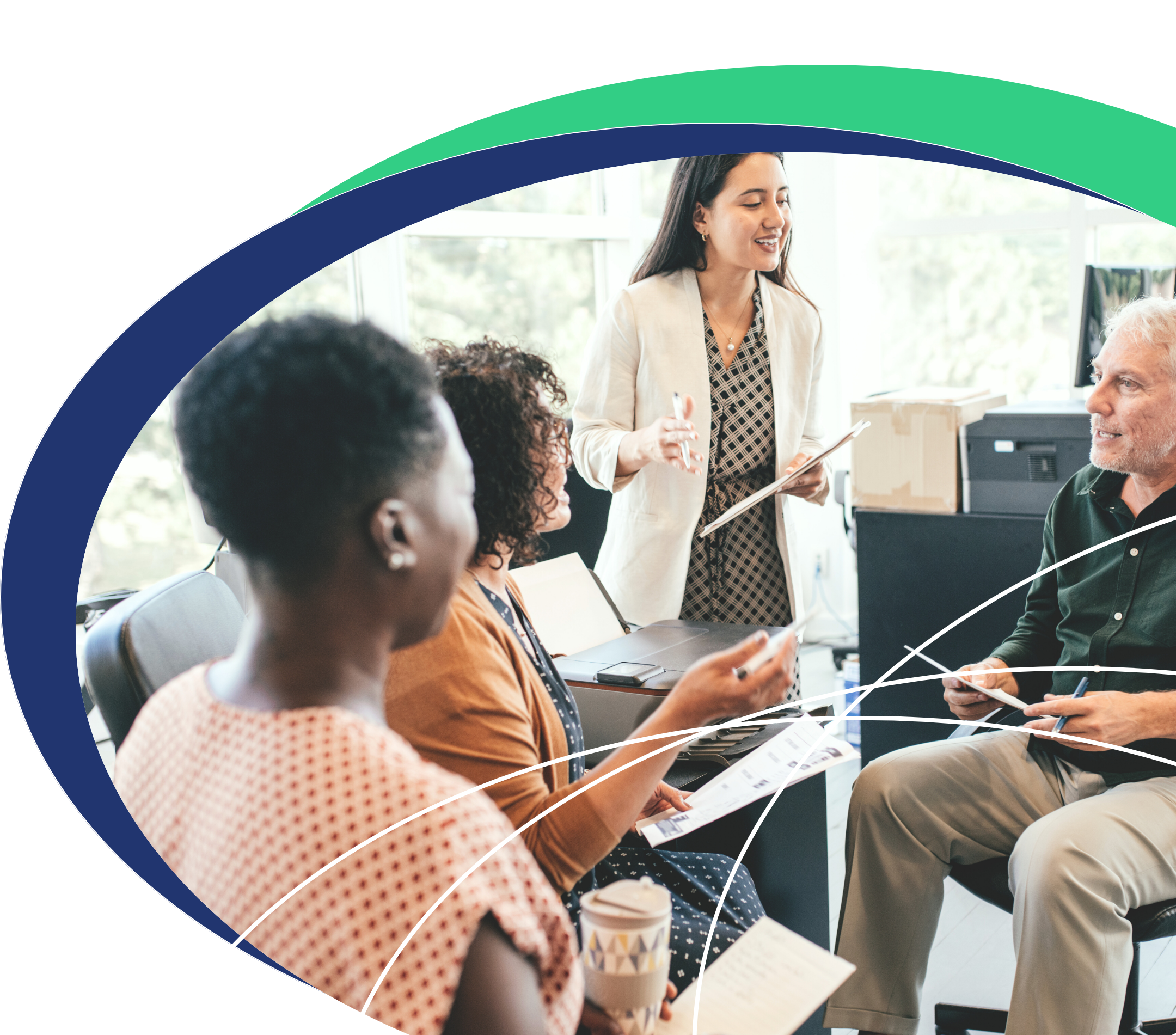 Four people sat around each other discussing senior living accreditation readiness program.