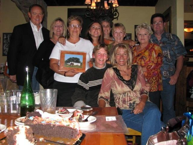 Volunteer crew celebrating together after the successful closing of the Pilot Point Arabian horse case, November 2009