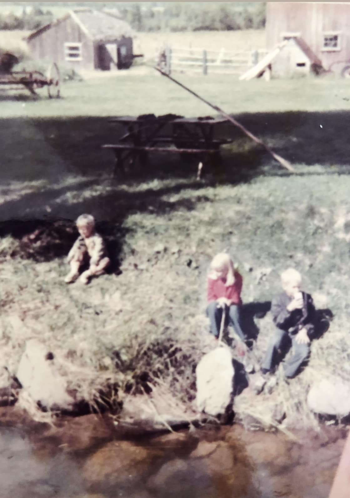 On the banks of Whittlesey Creek, right in front of the giant trout's hiding hole. With brothers Chris and Dan