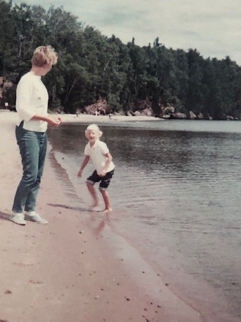 Mom and I on the beach, Lake Superior, Madeline Island. 1965. 55 years later I would return with my dog.