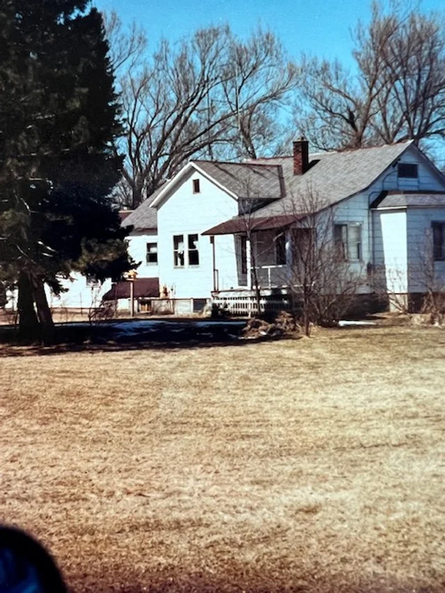 The farmhouse on Cherryville Road, Ashland Wisconsin, town of Barksdale. The tiny windows at the peak of the roof are what the bats used to access their roosts in the walls of the attic bedroom.