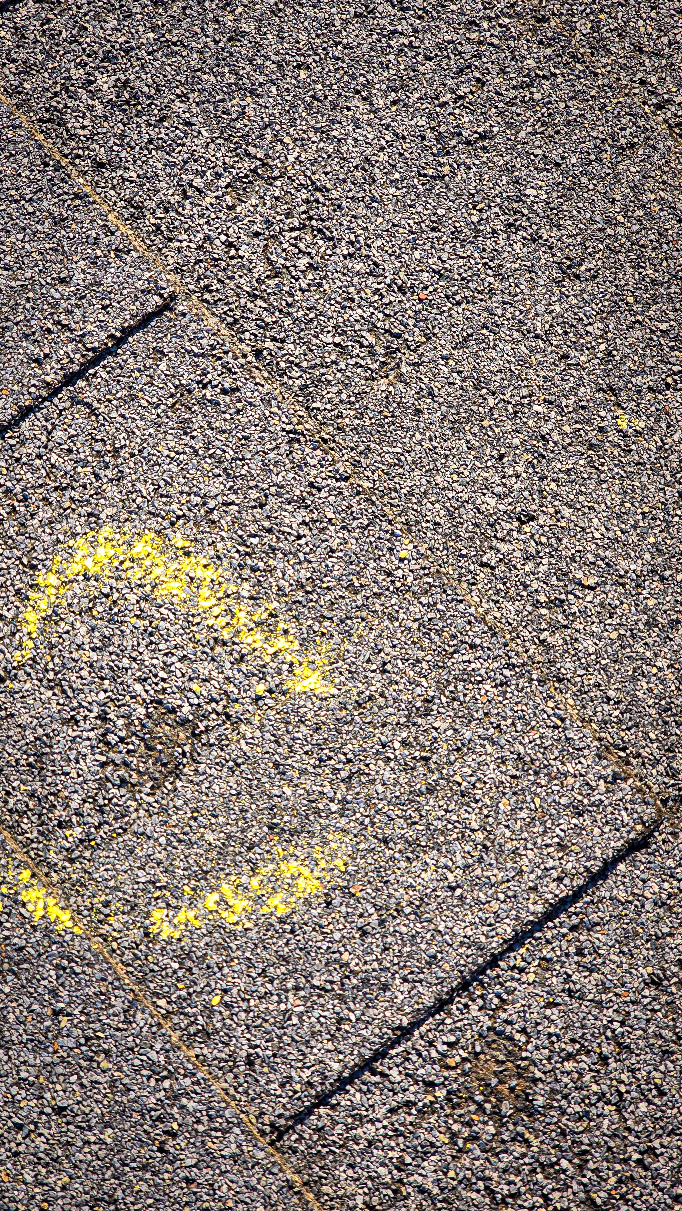Hail impact. Hail damage. Hail to the roof. Hail damage to shingles.
