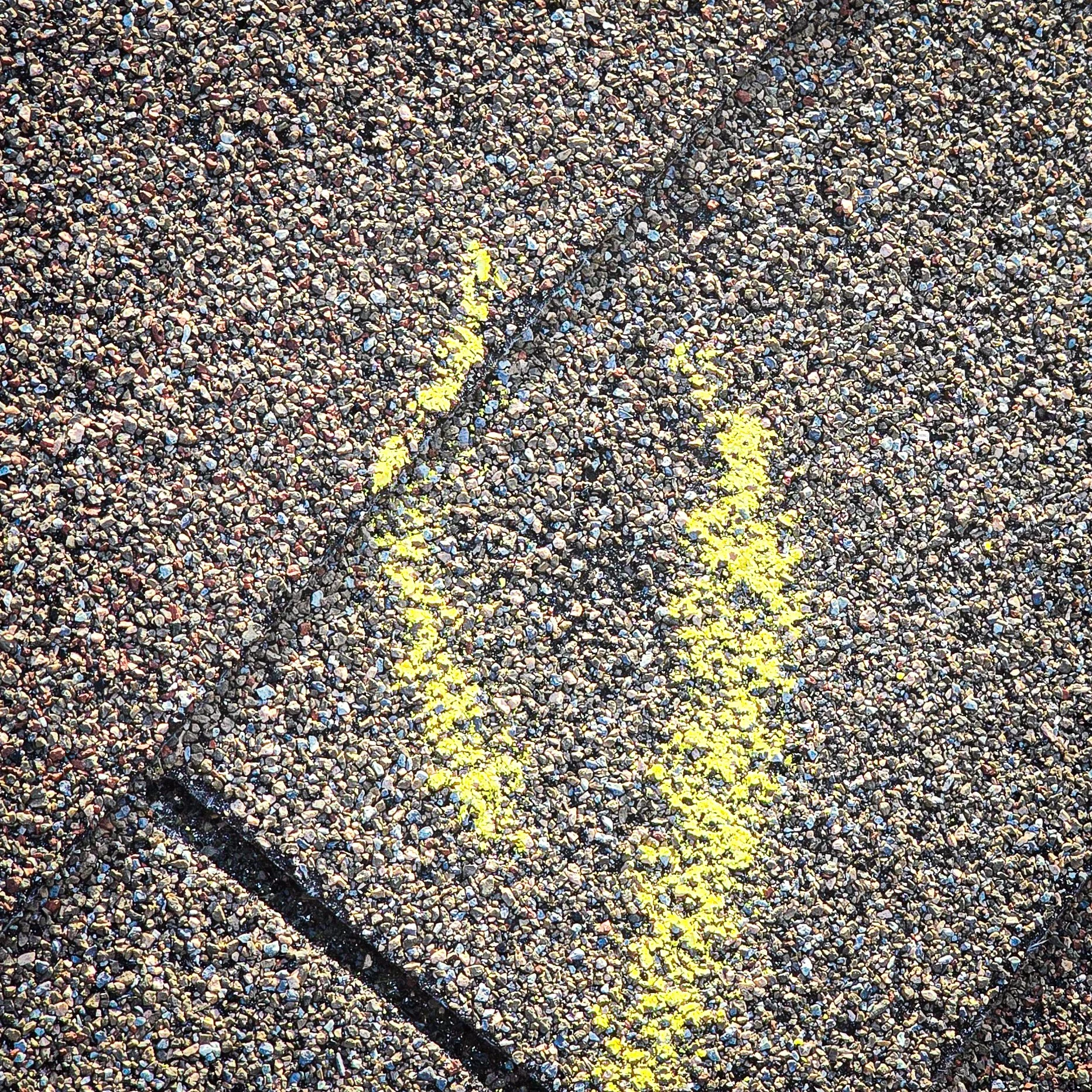 Hail impact. Hail damage. Hail to the roof. Hail damage to shingles.