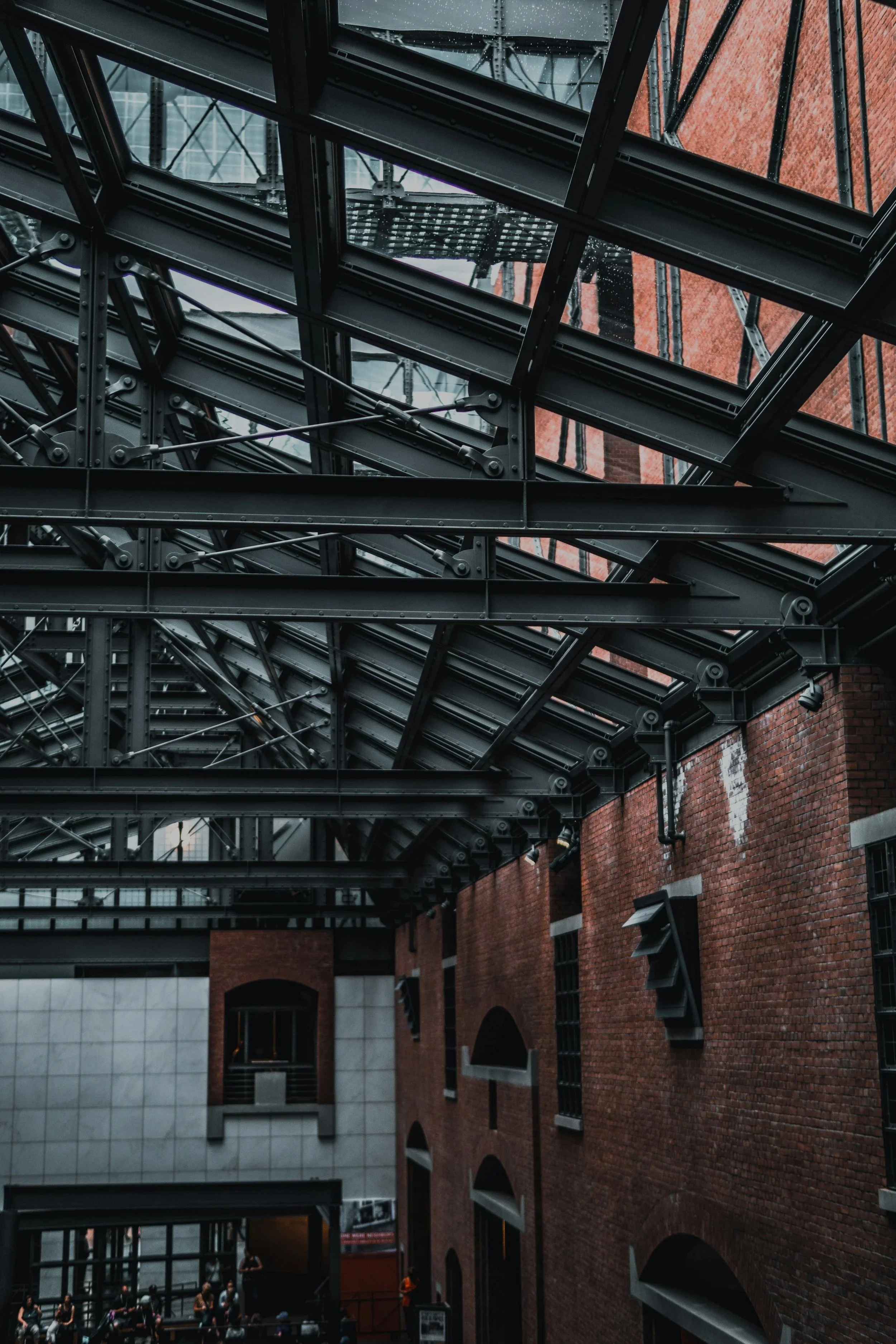 Brick wall, steel beams, sreel roof, cladding