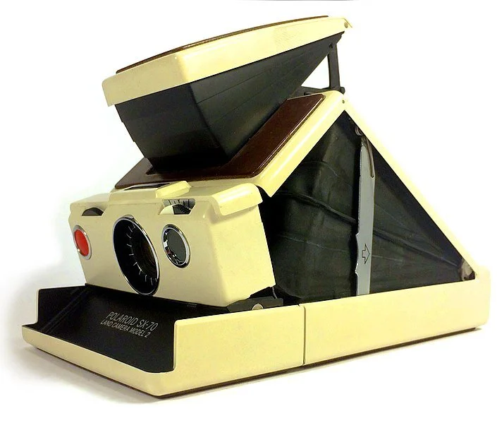 705px-Polaroid_SX-70_Land_Camera_model_2_instant_camera.jpg