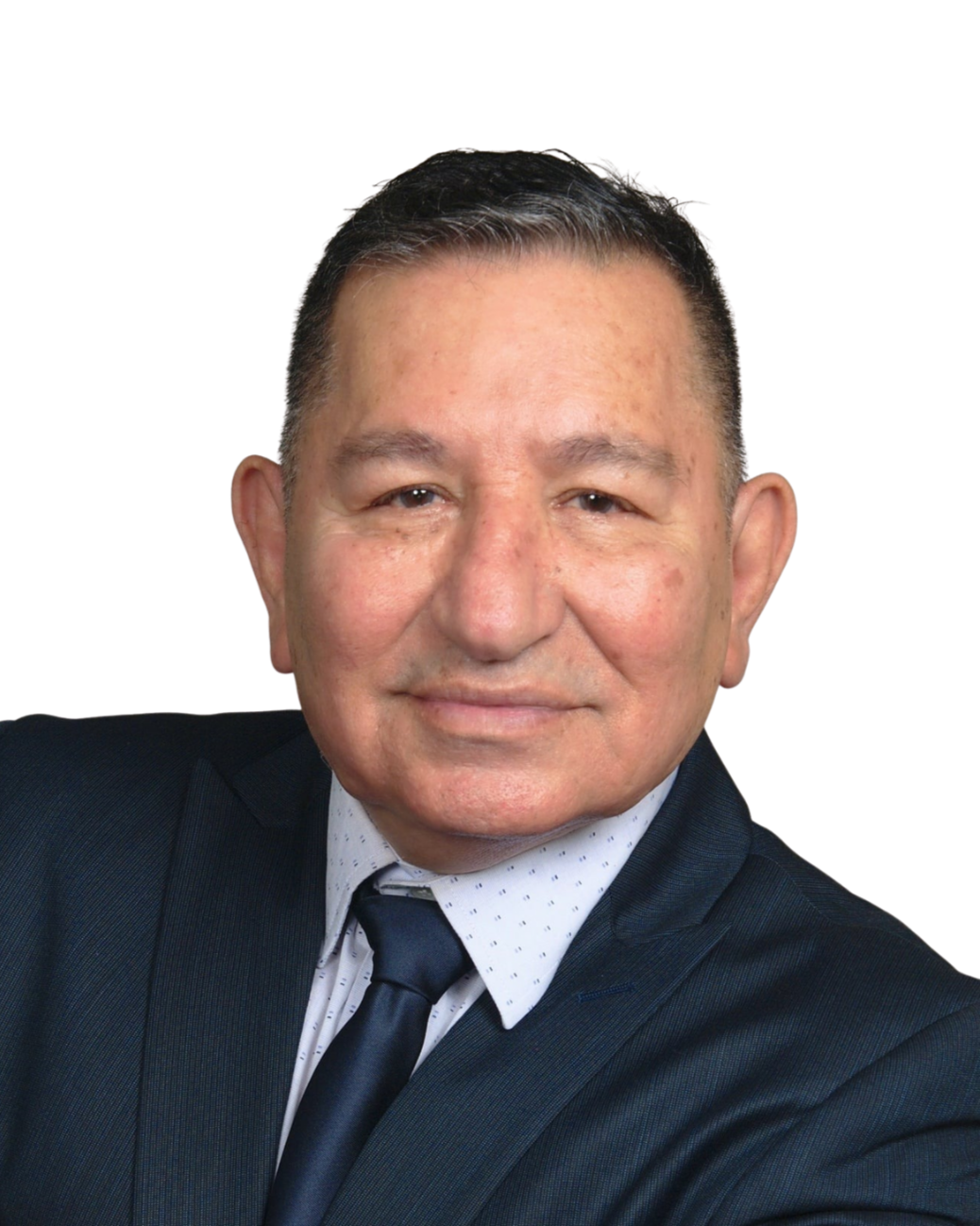A man in a business suit smiling for a professional portrait.