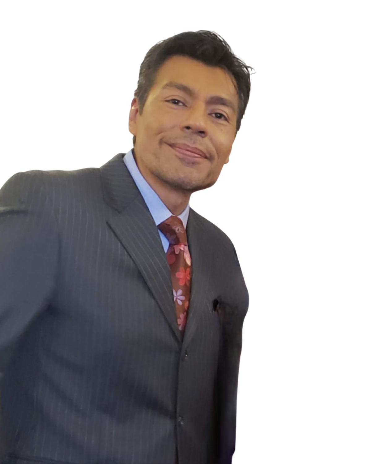 A man in a pinstripe suit, pale blue shirt, and floral tie, smiling slightly, with a colorful distorted background