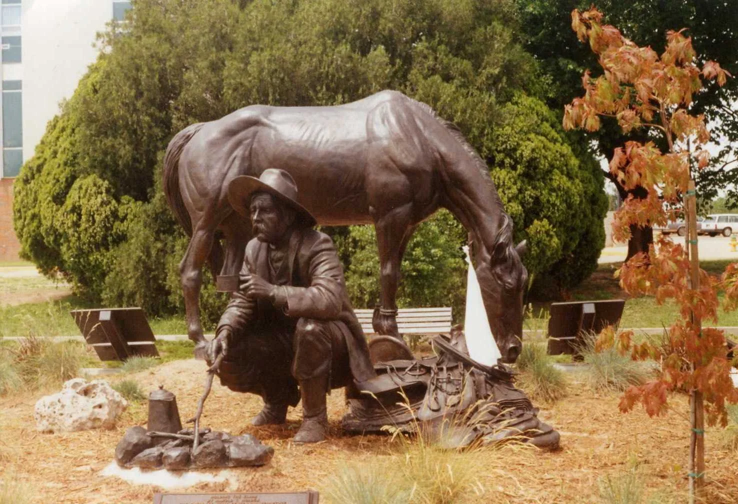 Name: Holding the Claim
Description: On April 17, 1993, H's 4th monument, "Holding the Claim", which is a companion piece to Boomer, was unveiled in Government Springs Park in Enid, OK. This piece also commemorates the largest land run in U. S. Hist