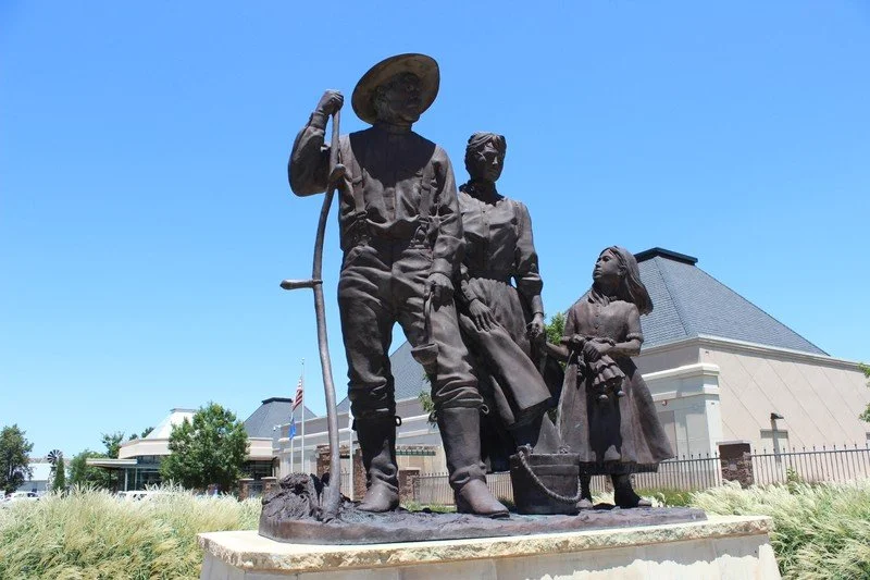 Name | Homesteaders
Description | Life and one half size Centennial Monument, which was dedicated on September 16, 2007, in front of the New Regional Heritage Museum in Enid, Oklahoma.