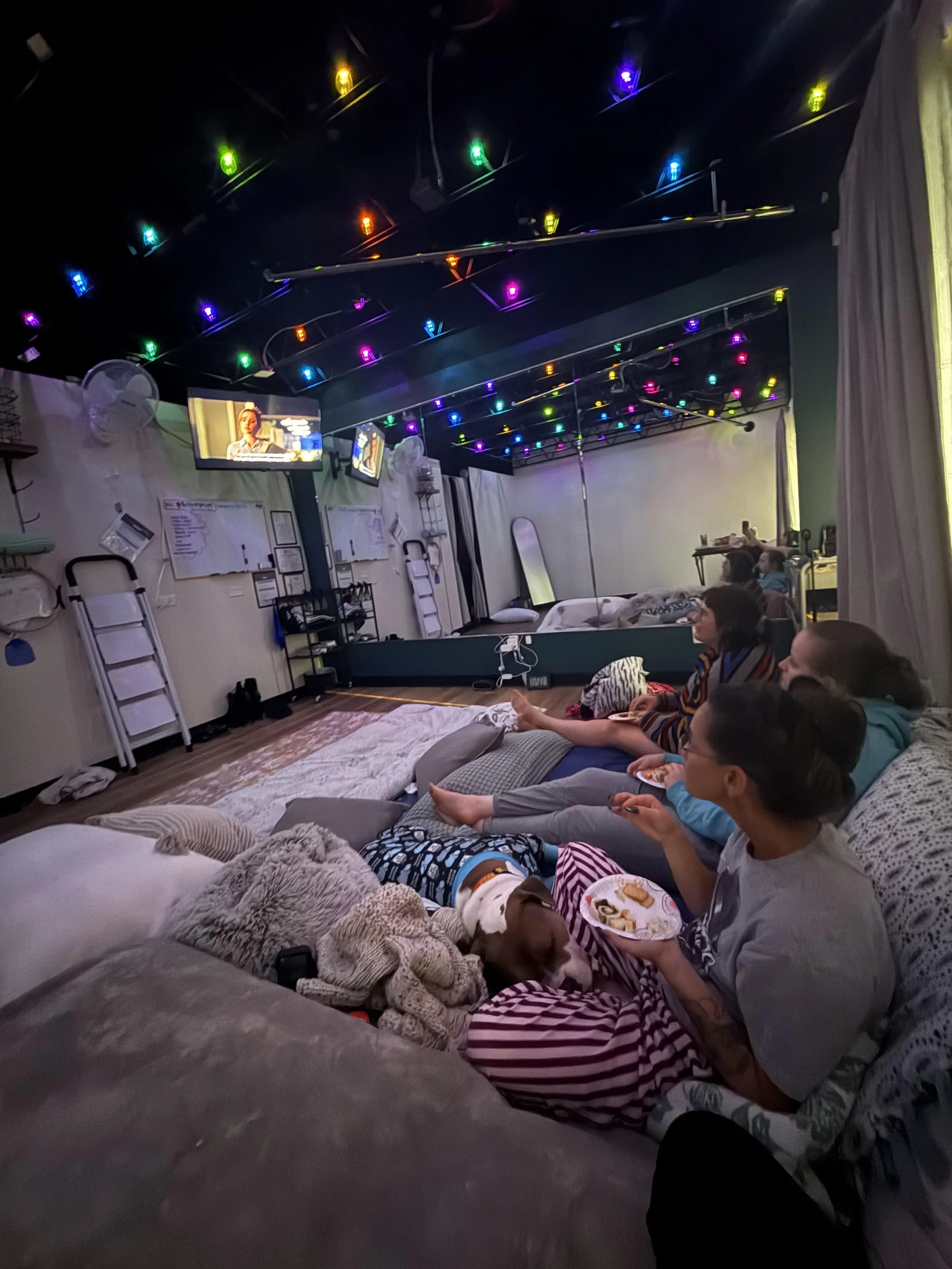 three women watching a movie in a cozy studio, Hudson, WI