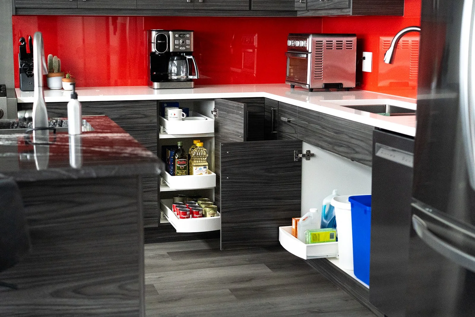 Kitchen cabinets with rollout drawer storage solutions installed