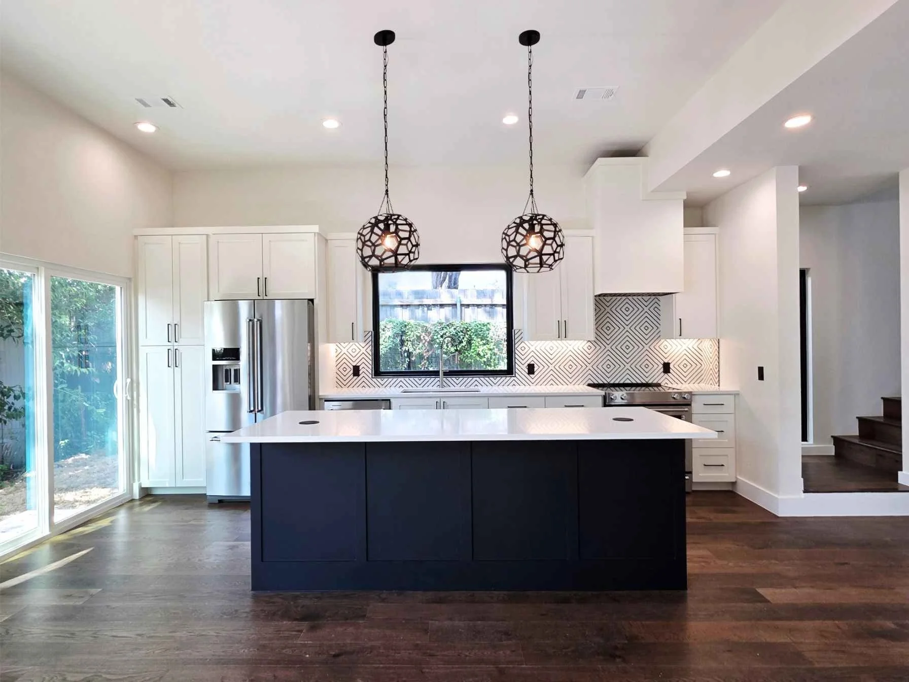 Open kitchen in a two-bedroom downtown Austin ADU by Atria Design and Build.