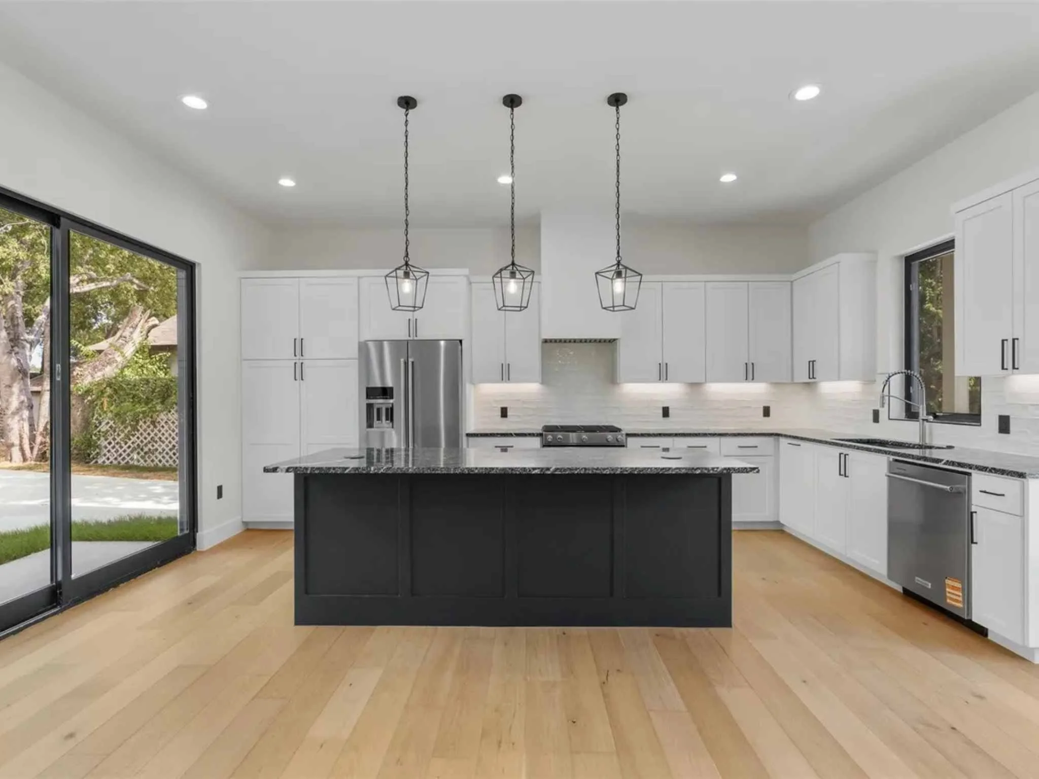 Open kitchen in a two-bedroom downtown Austin ADU by Atria Design and Build.