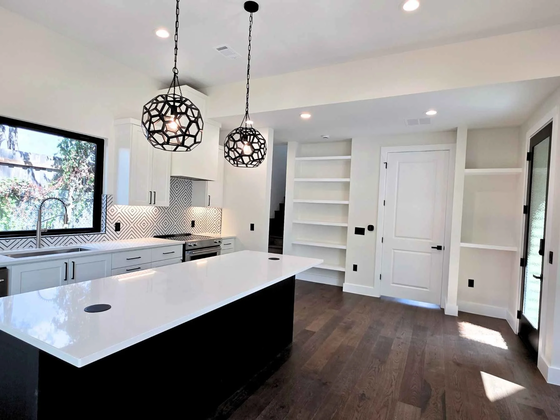 Open kitchen in a two-bedroom downtown Austin ADU by Atria Design and Build.