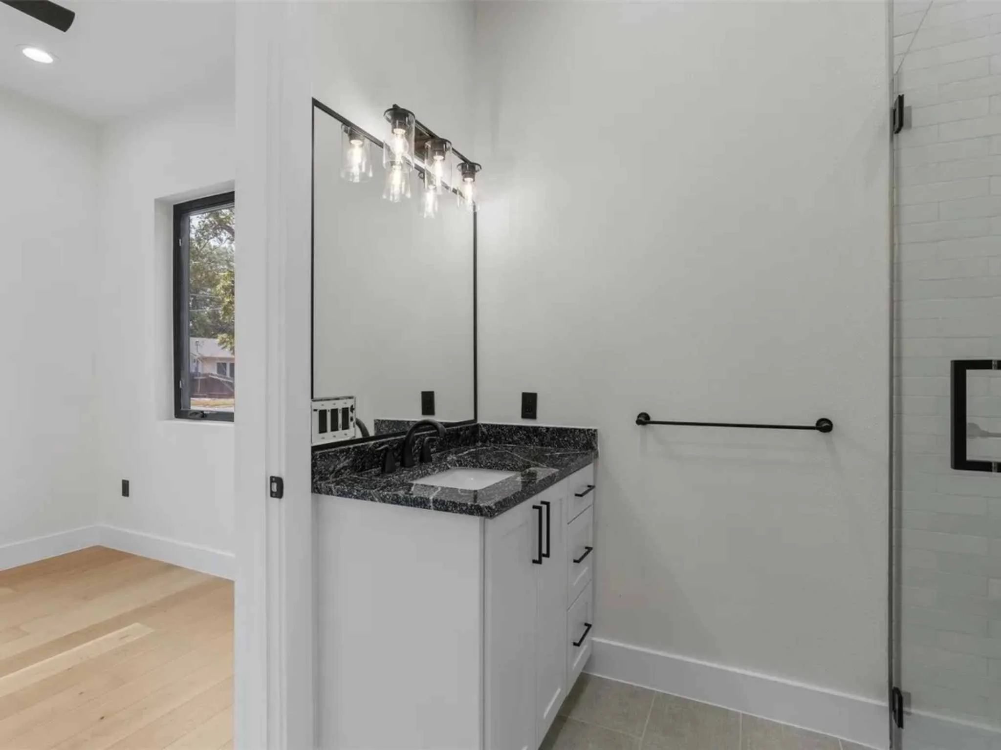 Custom guest bathroom in a downtown Austin home by Atria Design and Build.