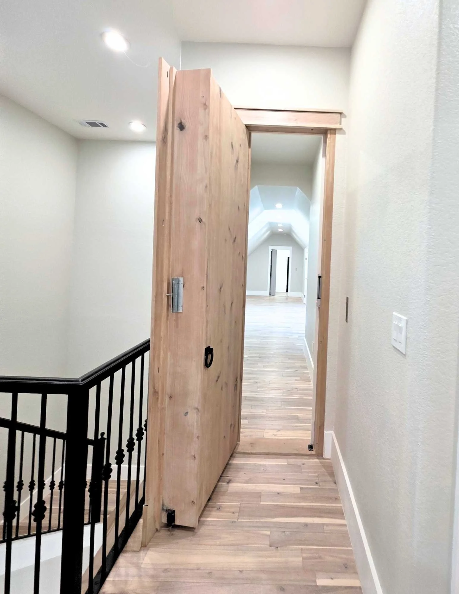 Hidden doorway into Casita with custom shelves