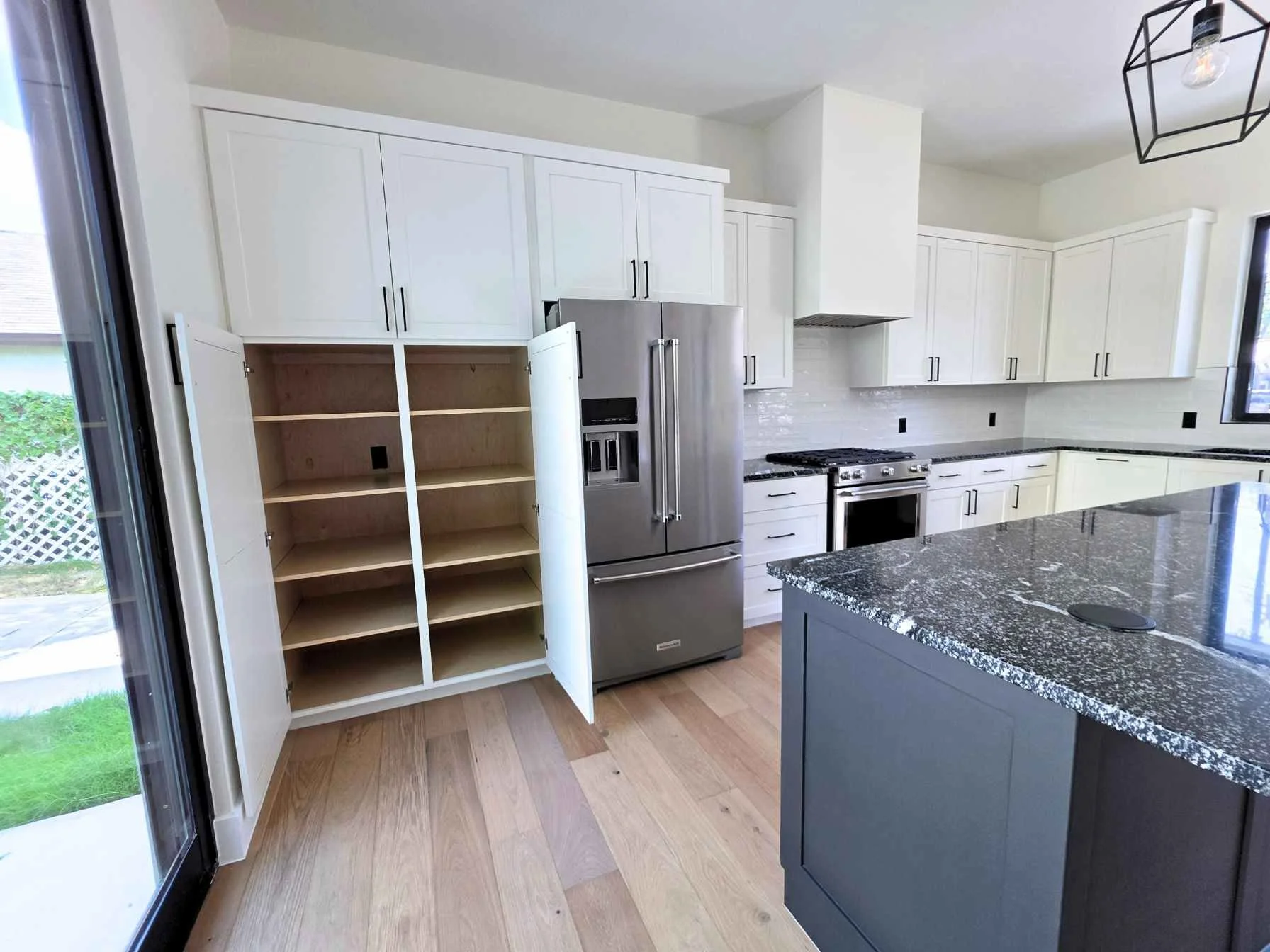 Custom built-in cabinetry in a downtown Austin home by Atria Design and Build.