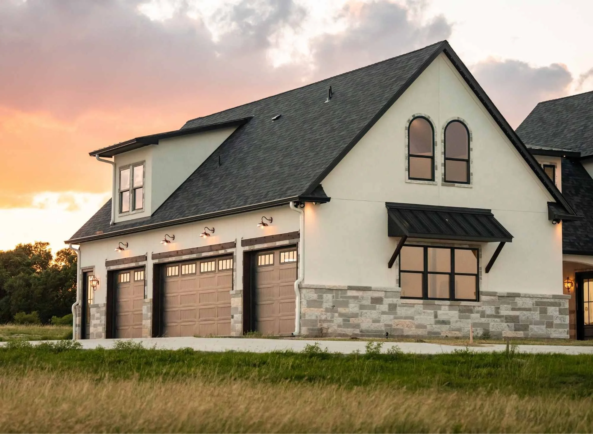 Exterior with 4 car garage and Casita above
