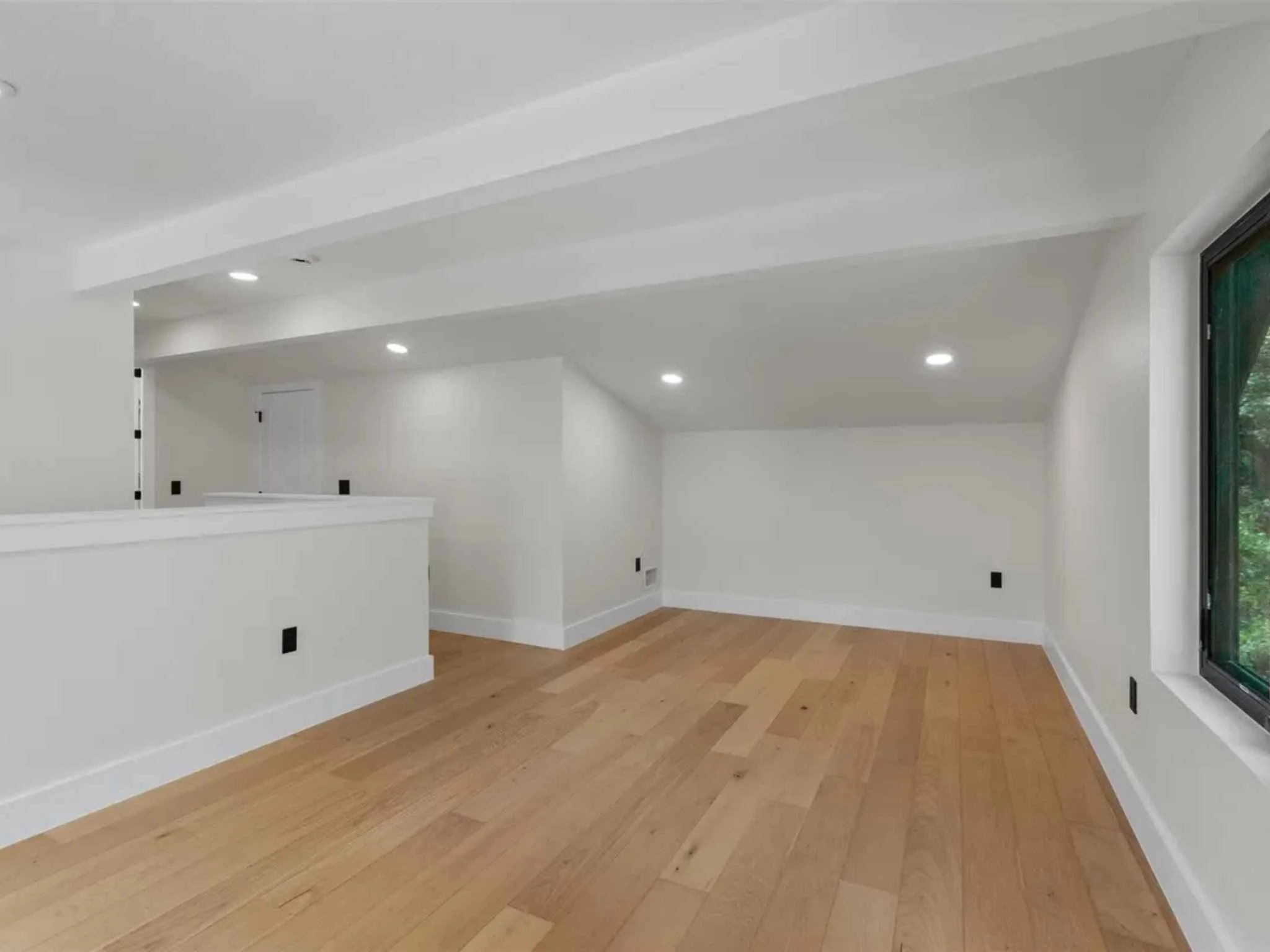 Open loft area in a downtown Austin custom home by Atria Design and Build.