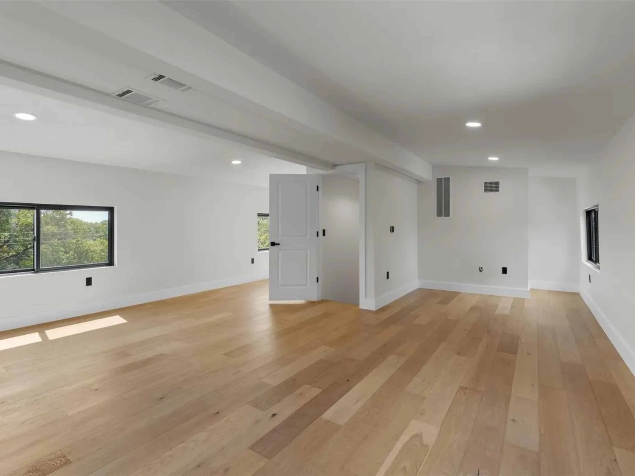 Open loft area in a downtown Austin custom home by Atria Design and Build.