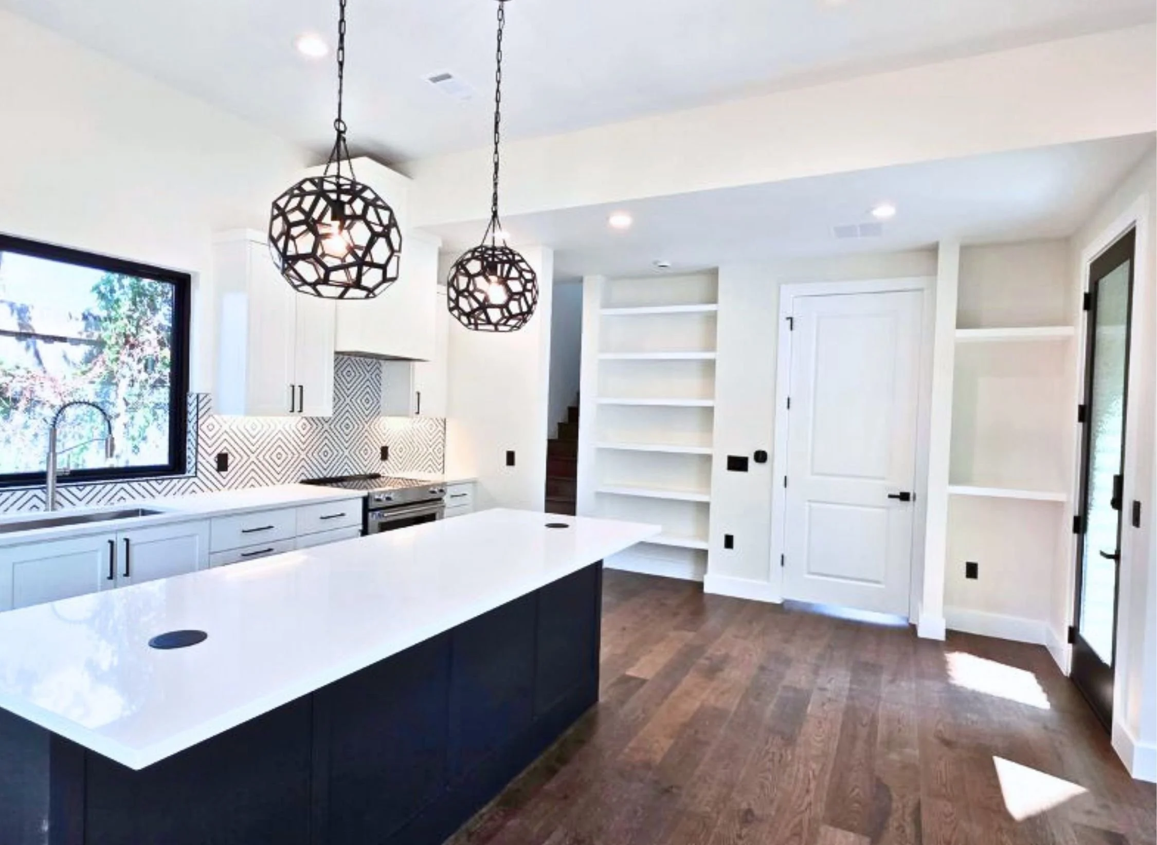 Open kitchen in a two-bedroom downtown Austin ADU by Atria Design and Build.