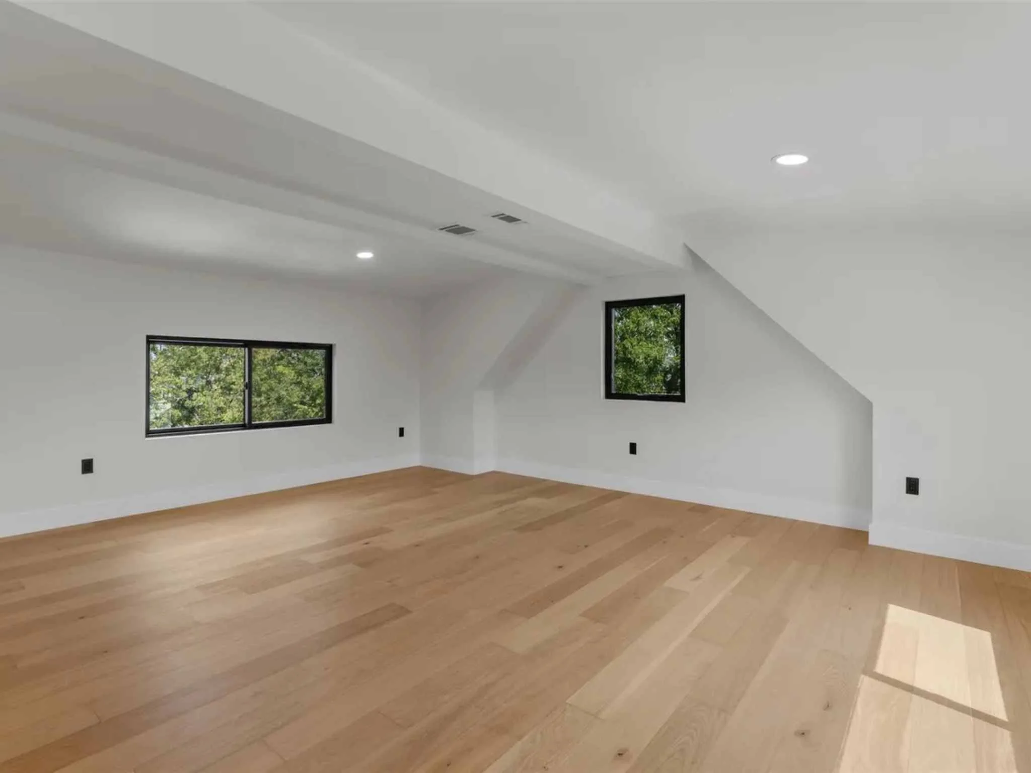 Open loft area in a downtown Austin custom home by Atria Design and Build.