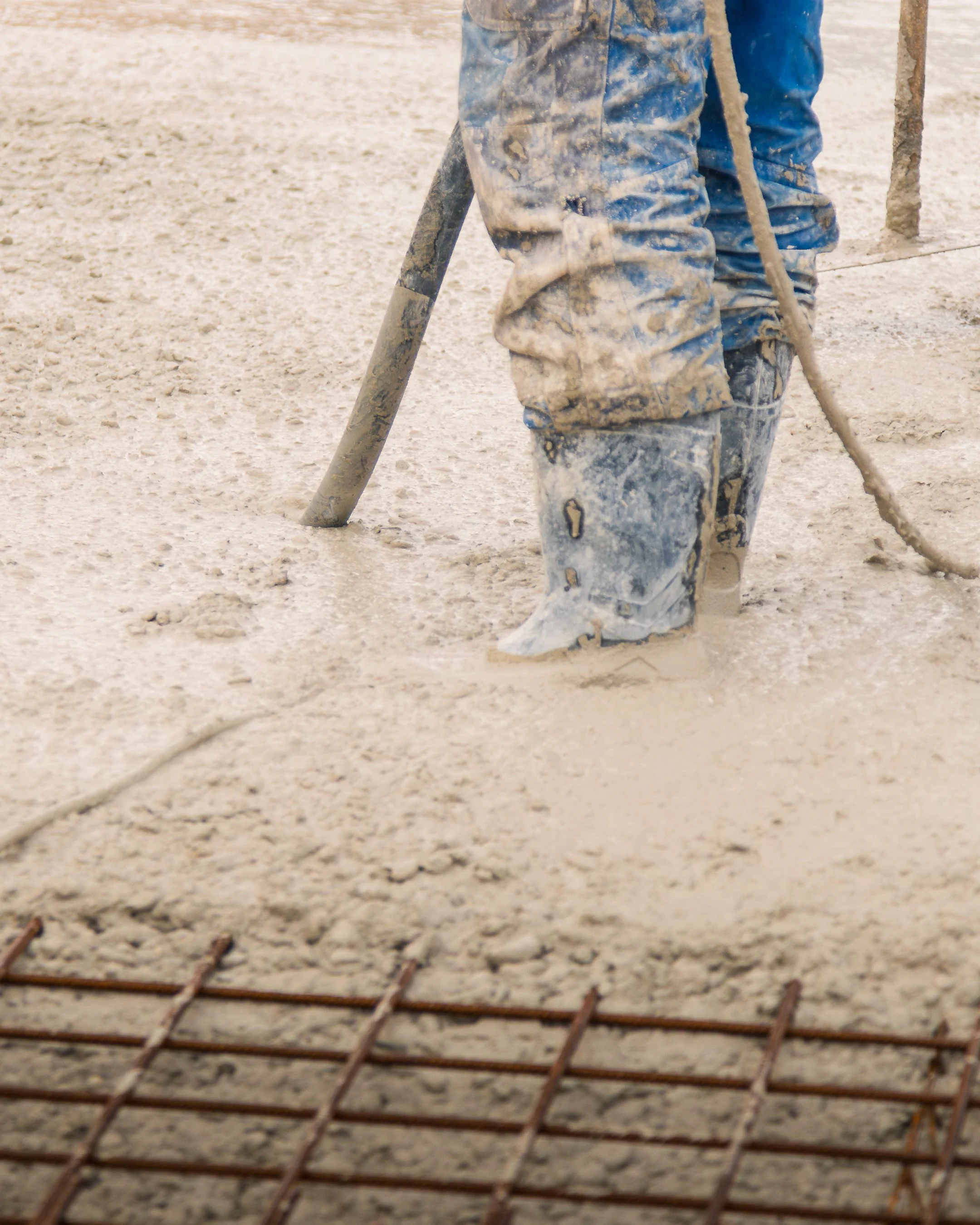 Beton trillen met trilnaald