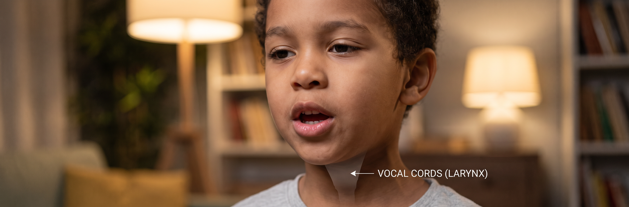 Child demonstrating proper vocal cord technique and voice production during speech therapy session