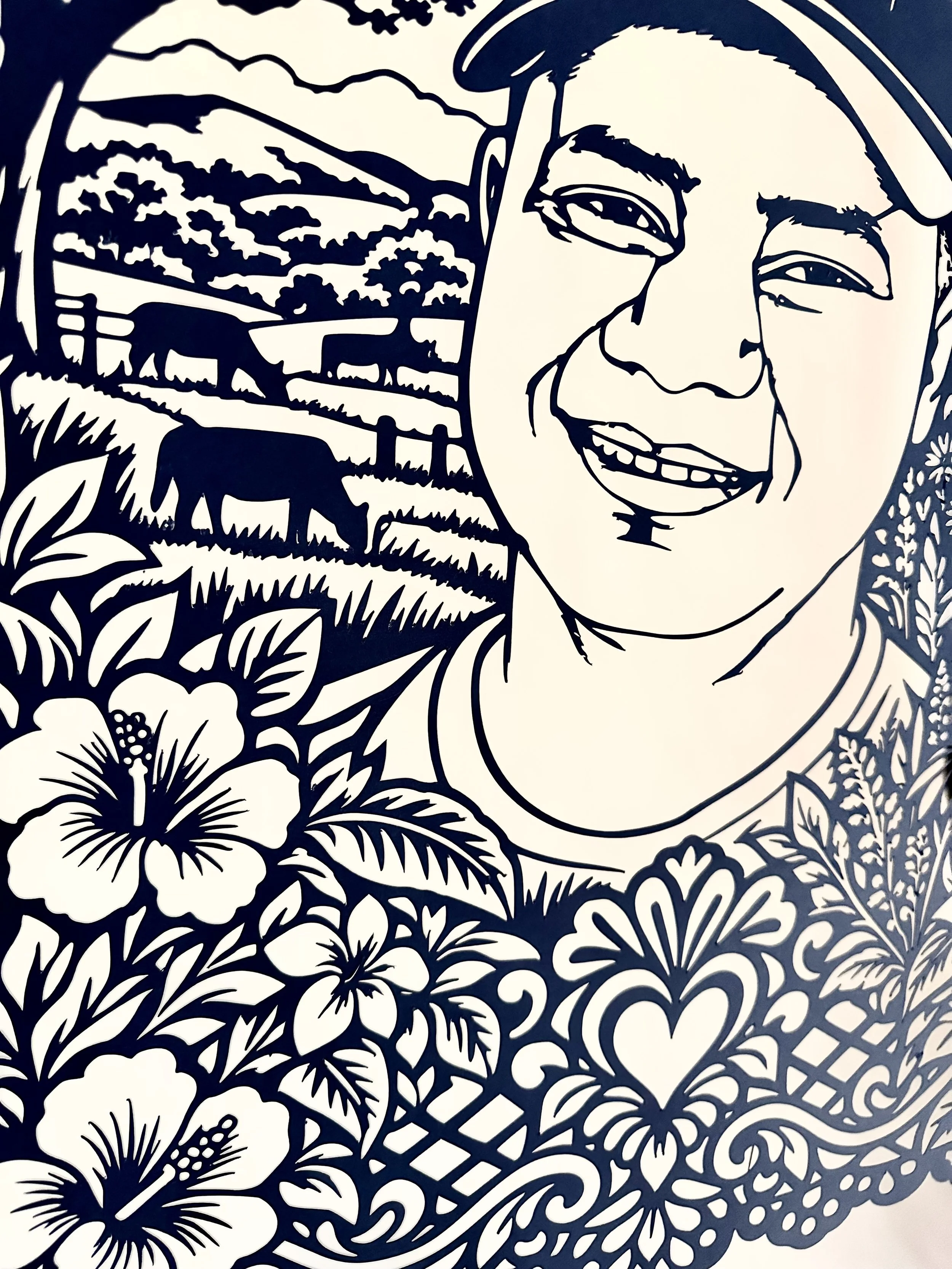 Angled view of Carlos Josué Marchena Marchena’s cut paper portrait .