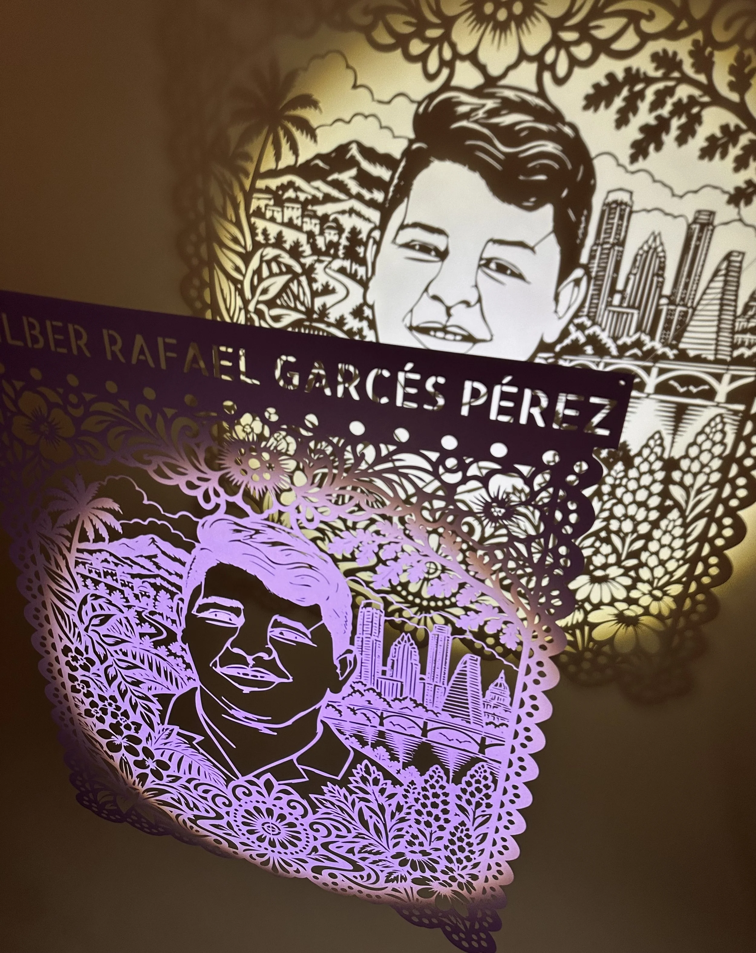Portrait of Wilber Rafael Garces Perez that is casting a shadow on the wall.