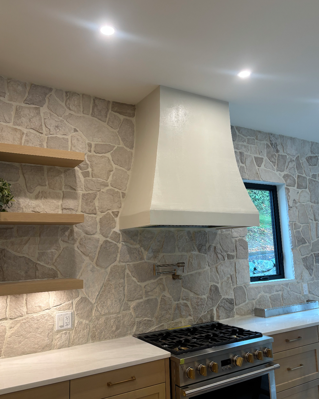 Stone work and an interior plastered range hood 