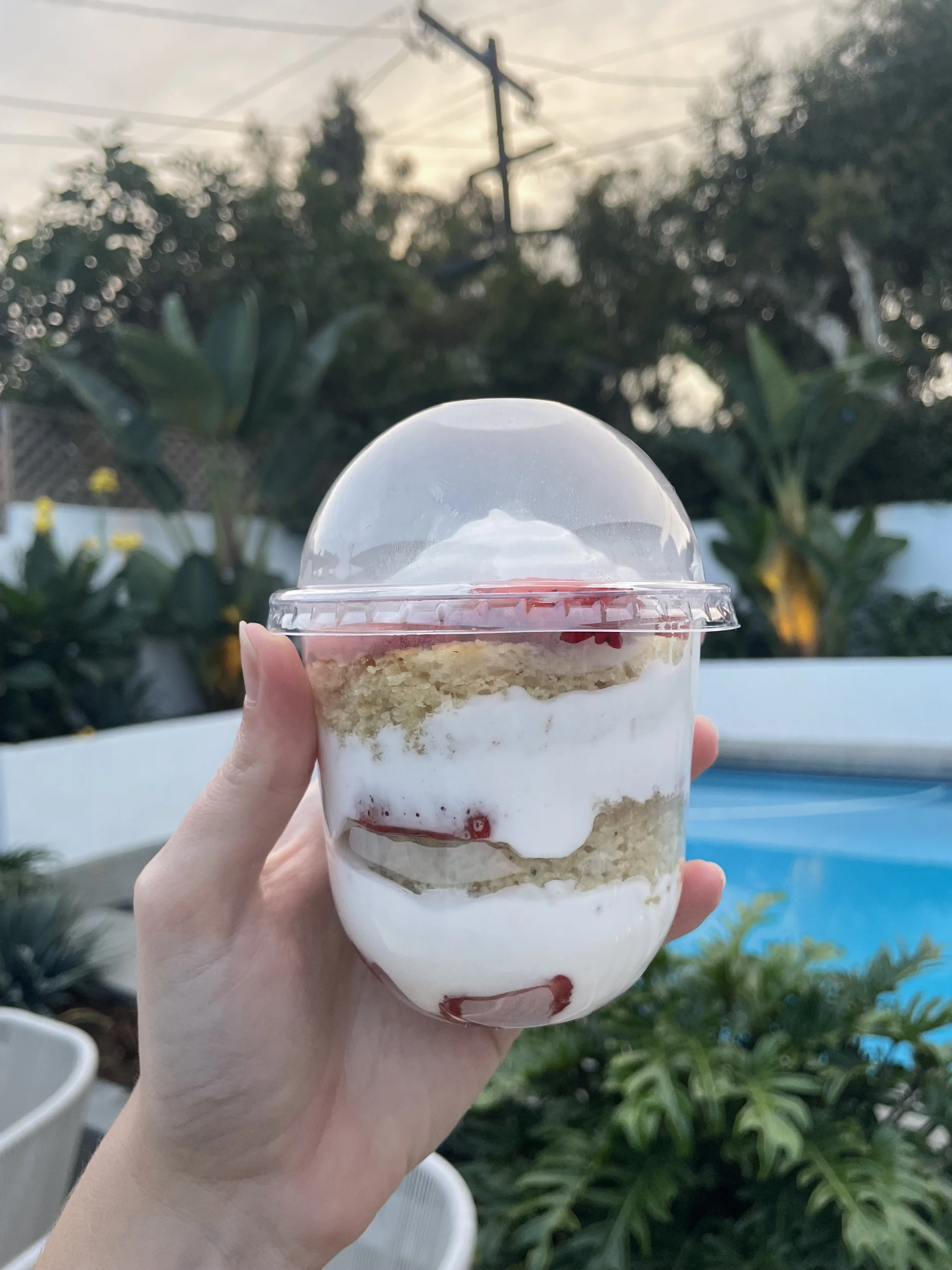 Strawberry shortcake layer jar with greenery in the background
