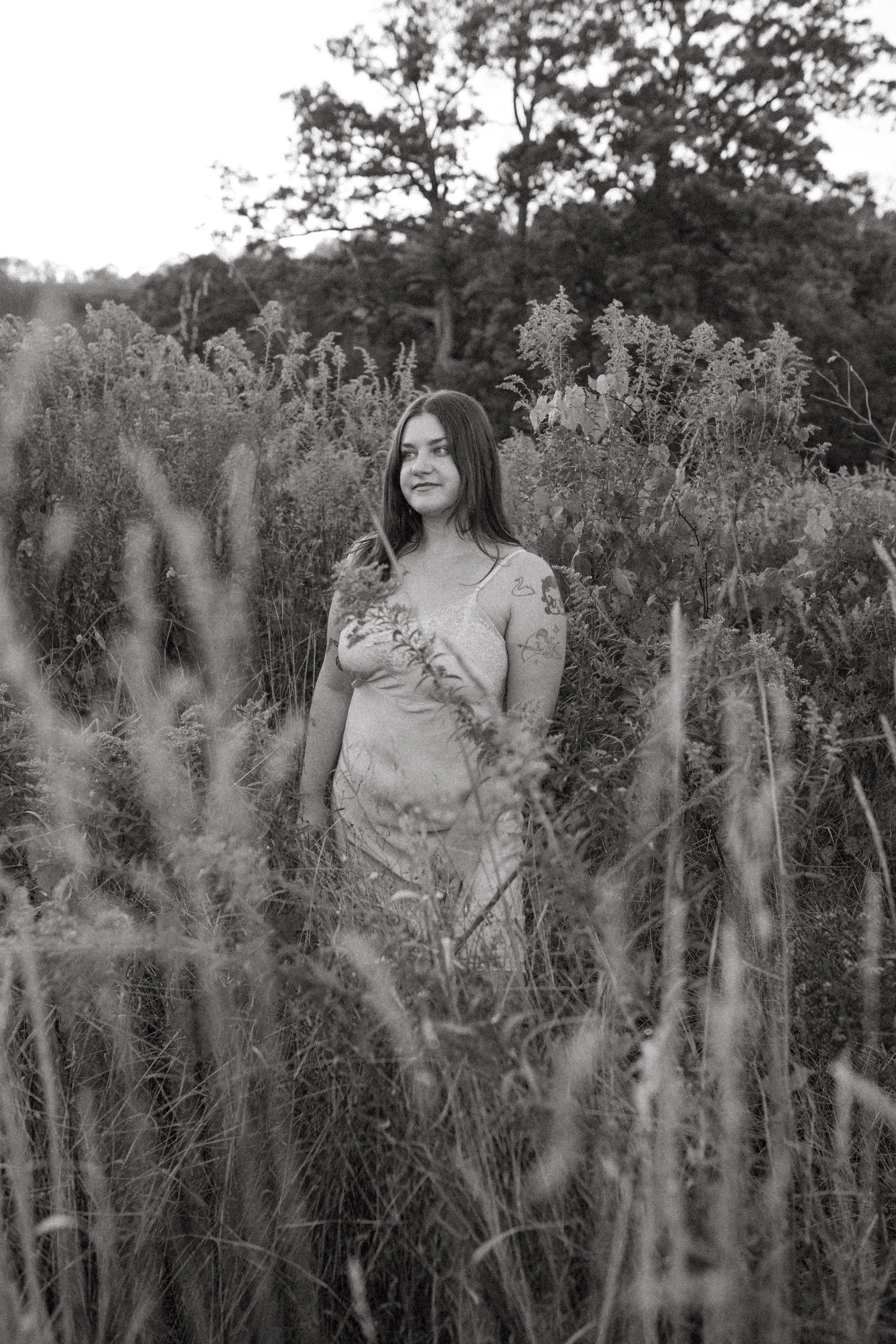 Tarot reader in a field of grasses