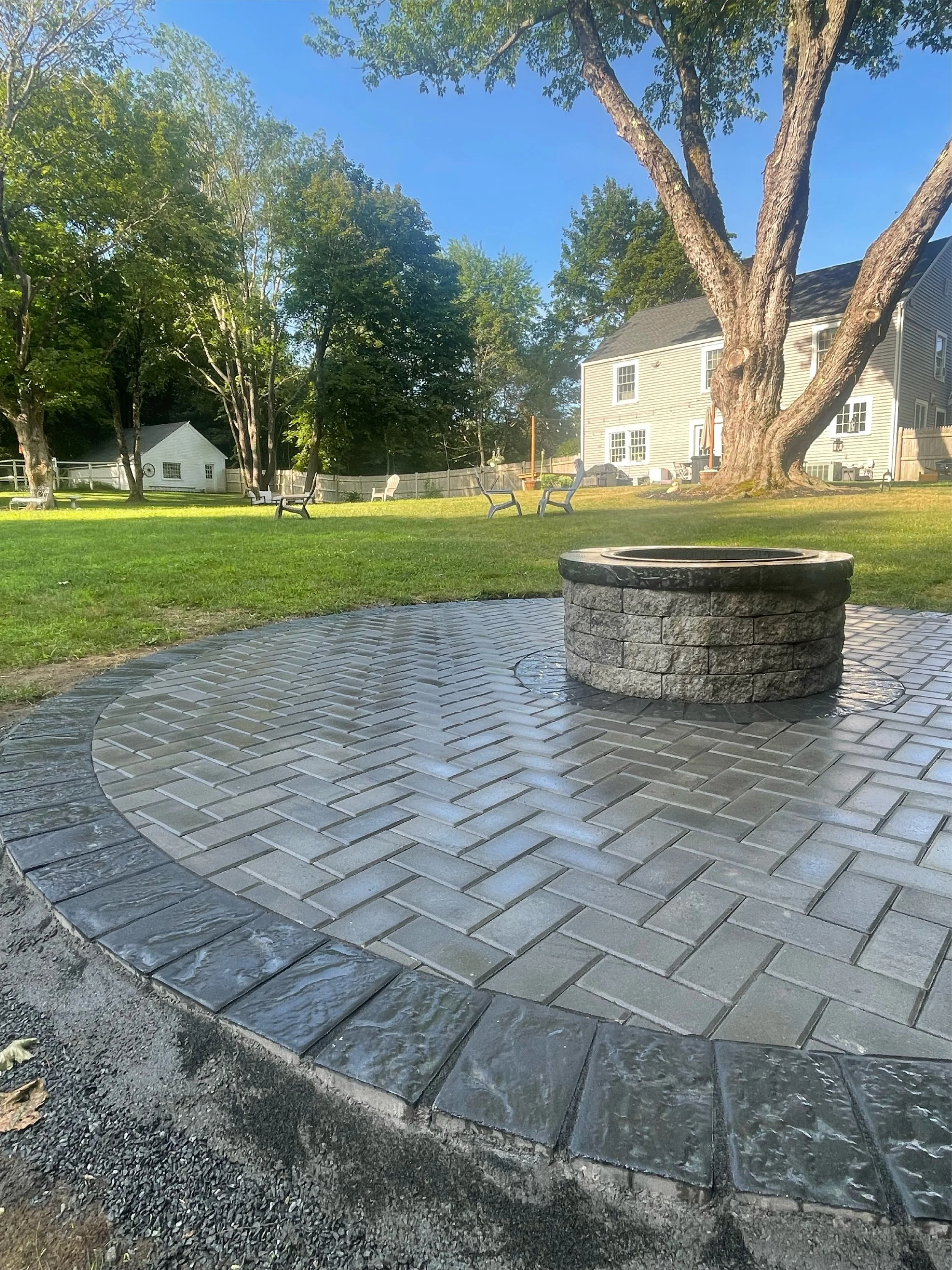 the-englishmen-mansory-patios-pathways-fire-pit-round-4.jpg