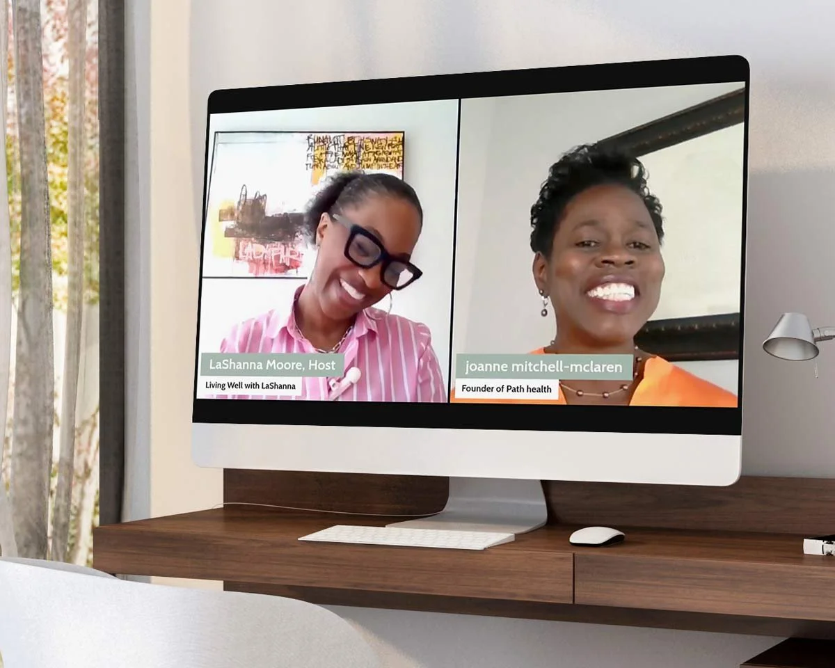 Computer monitor showing Joanne Mitchell-McLaren speaking on a podcast