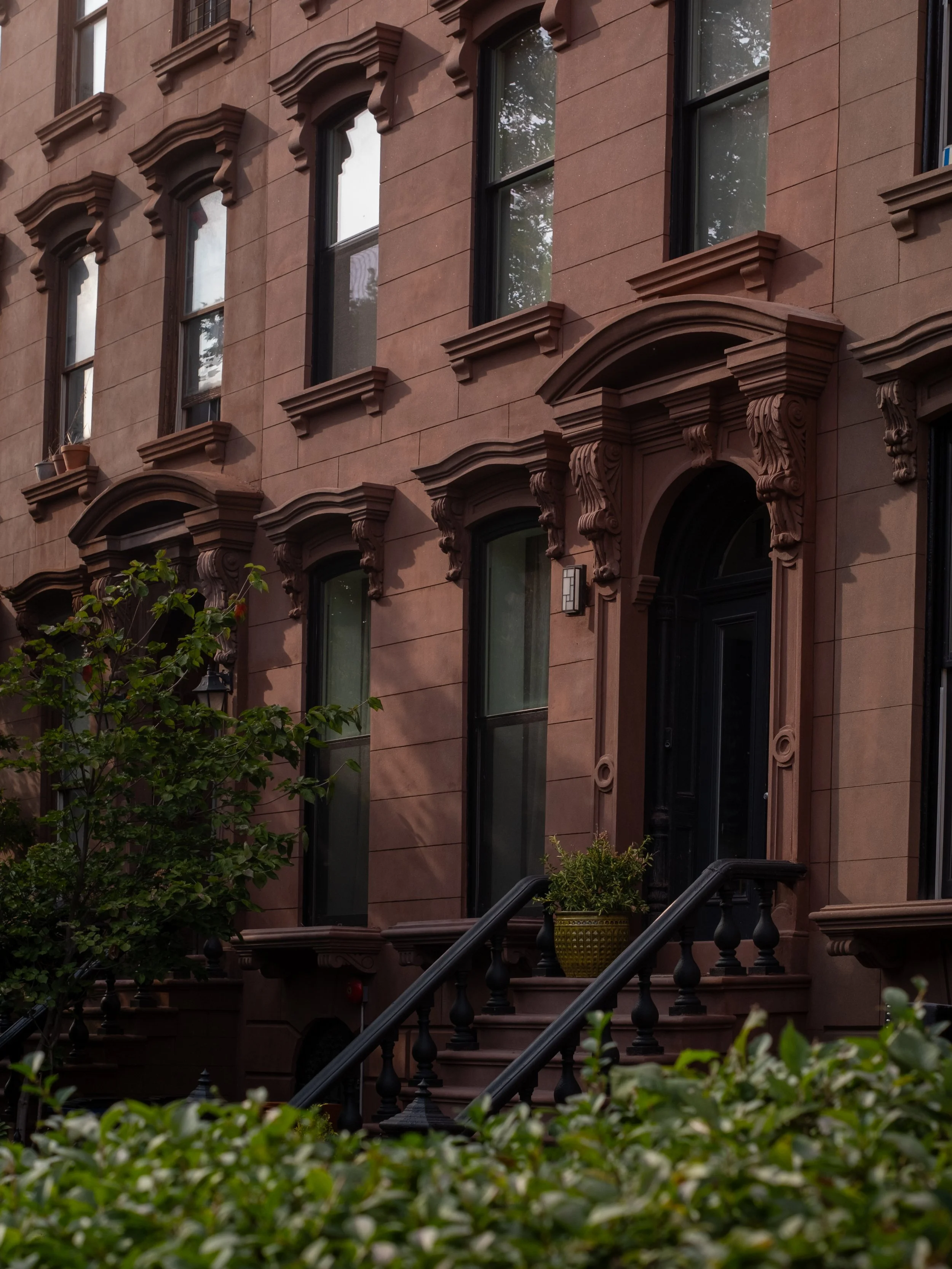 Stuyvesant Heights street view with historic Brooklyn brownstones
