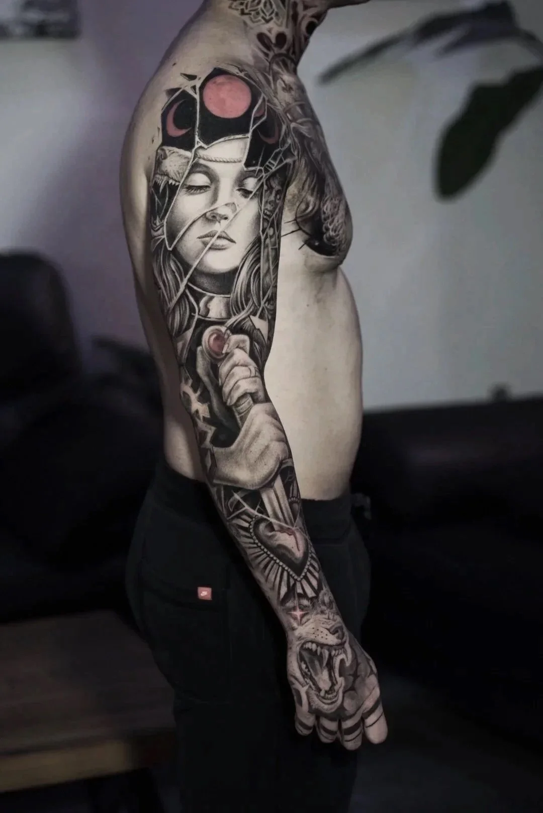 Detailed black and grey realism sleeve tattoo by Luis D Art Charlotte NC