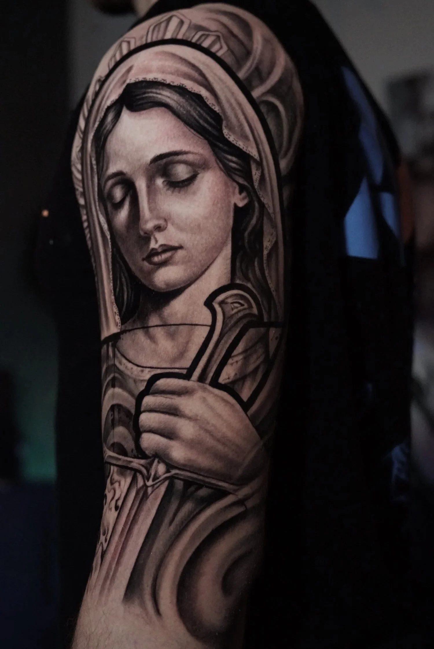 Black and grey Virgin Mary portrait realism tattoo by Luis D Art Charlotte NC