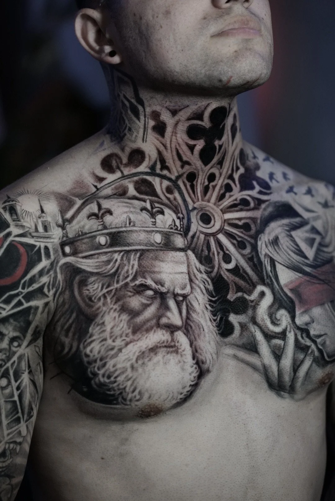 Black and grey gothic realism neck and chest tattoo by Luis D Art Charlotte