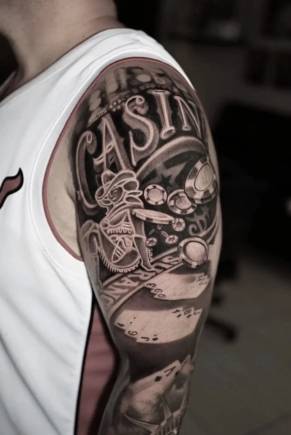 Casino themed realism tattoo with cards and poker chips by Luis D Art Charlotte