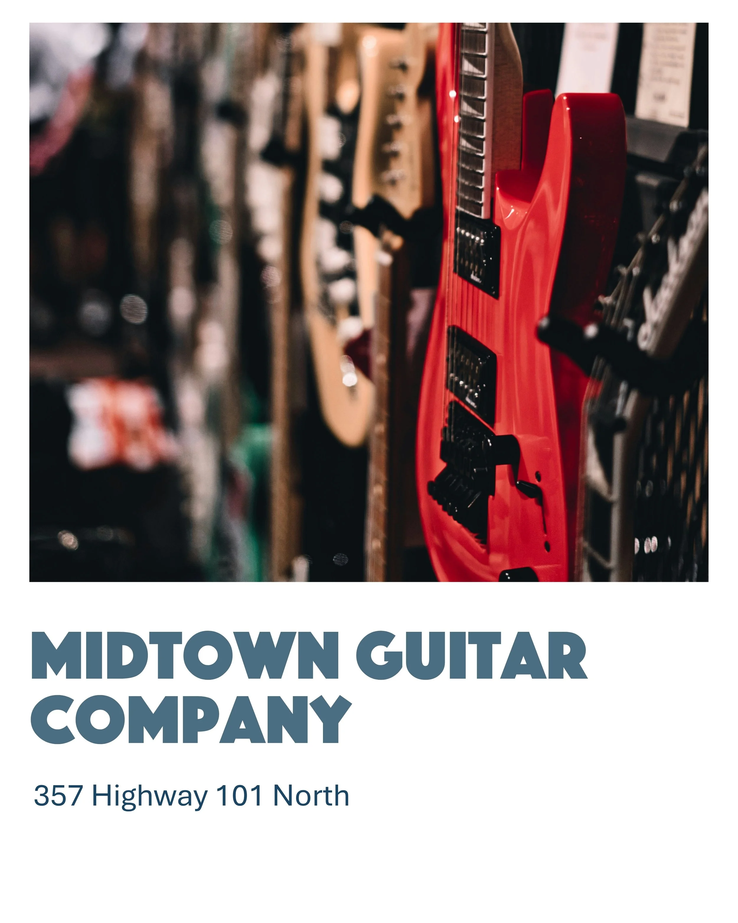 Red electric guitar hanging on display in a music store, with other guitars blurred in the background.