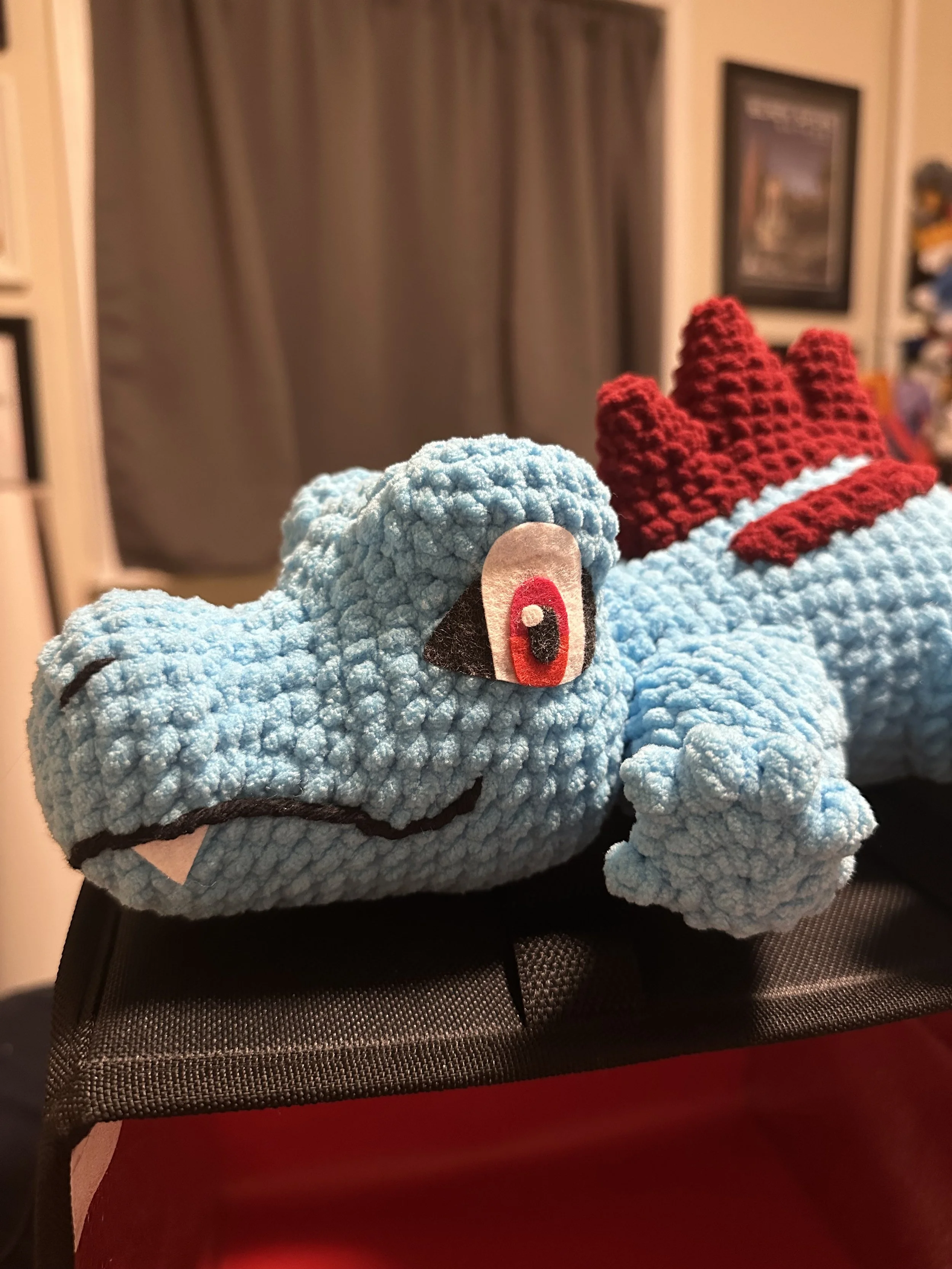 crochet Totodile with felt face and eyes