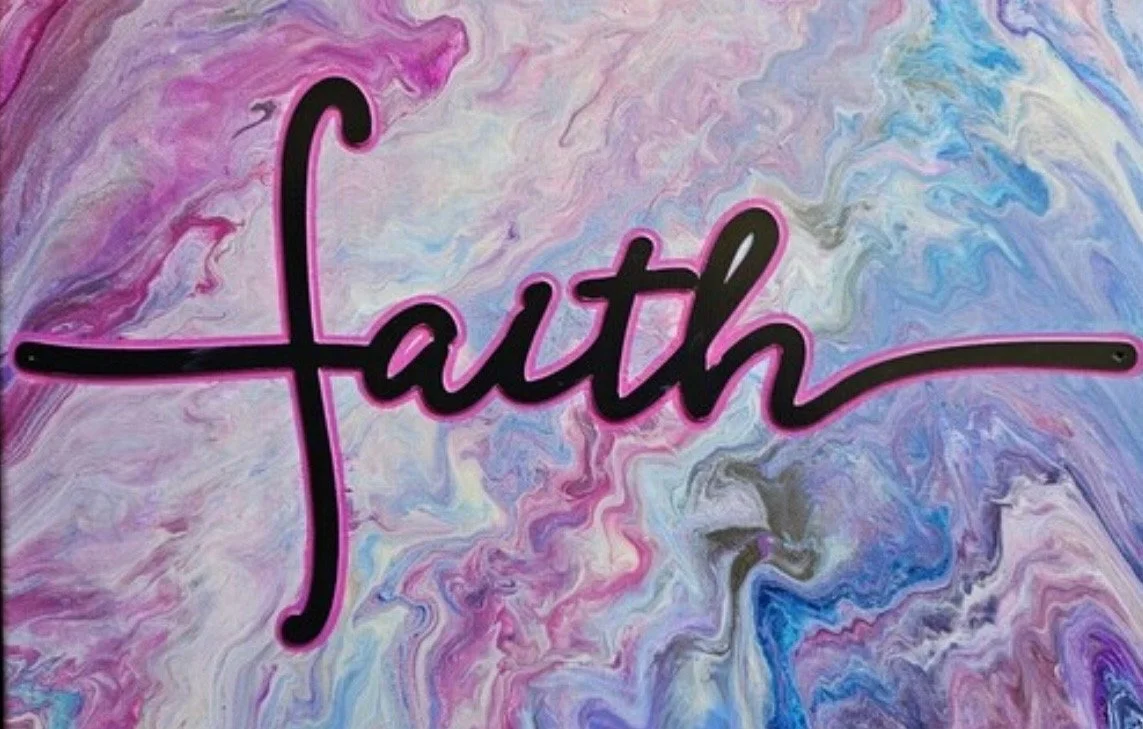 The word 'Faith' written in black cursive with pink outline against a colorful, marbled background of pink, purple, blue, and white swirls.